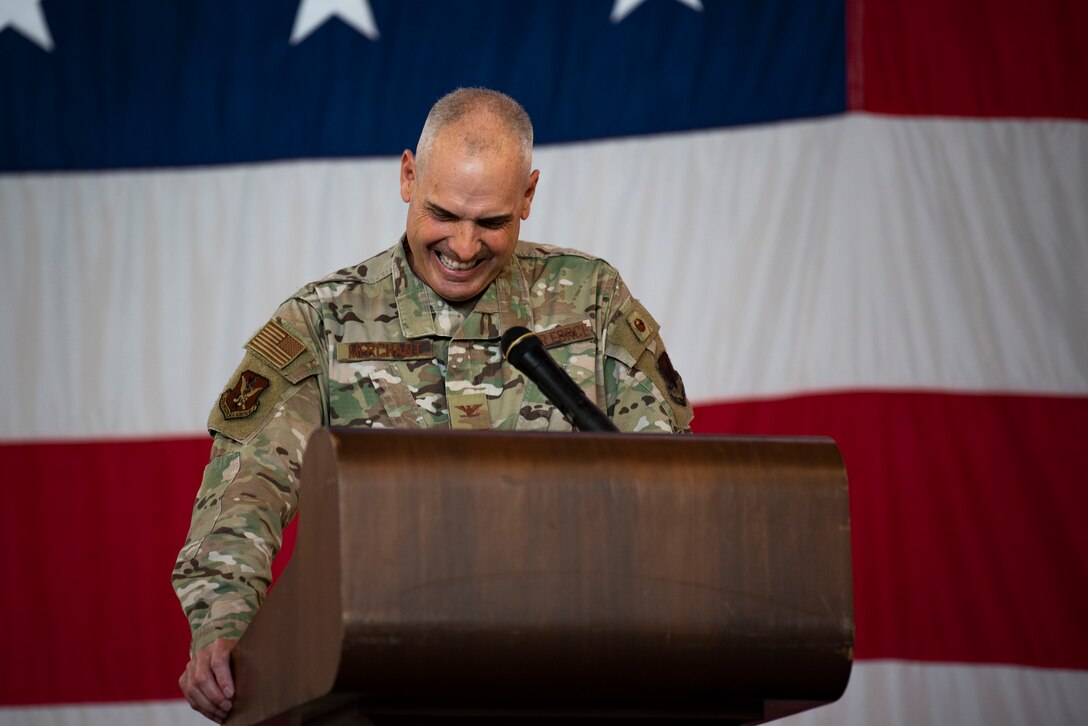 A photo of a commander laughing.