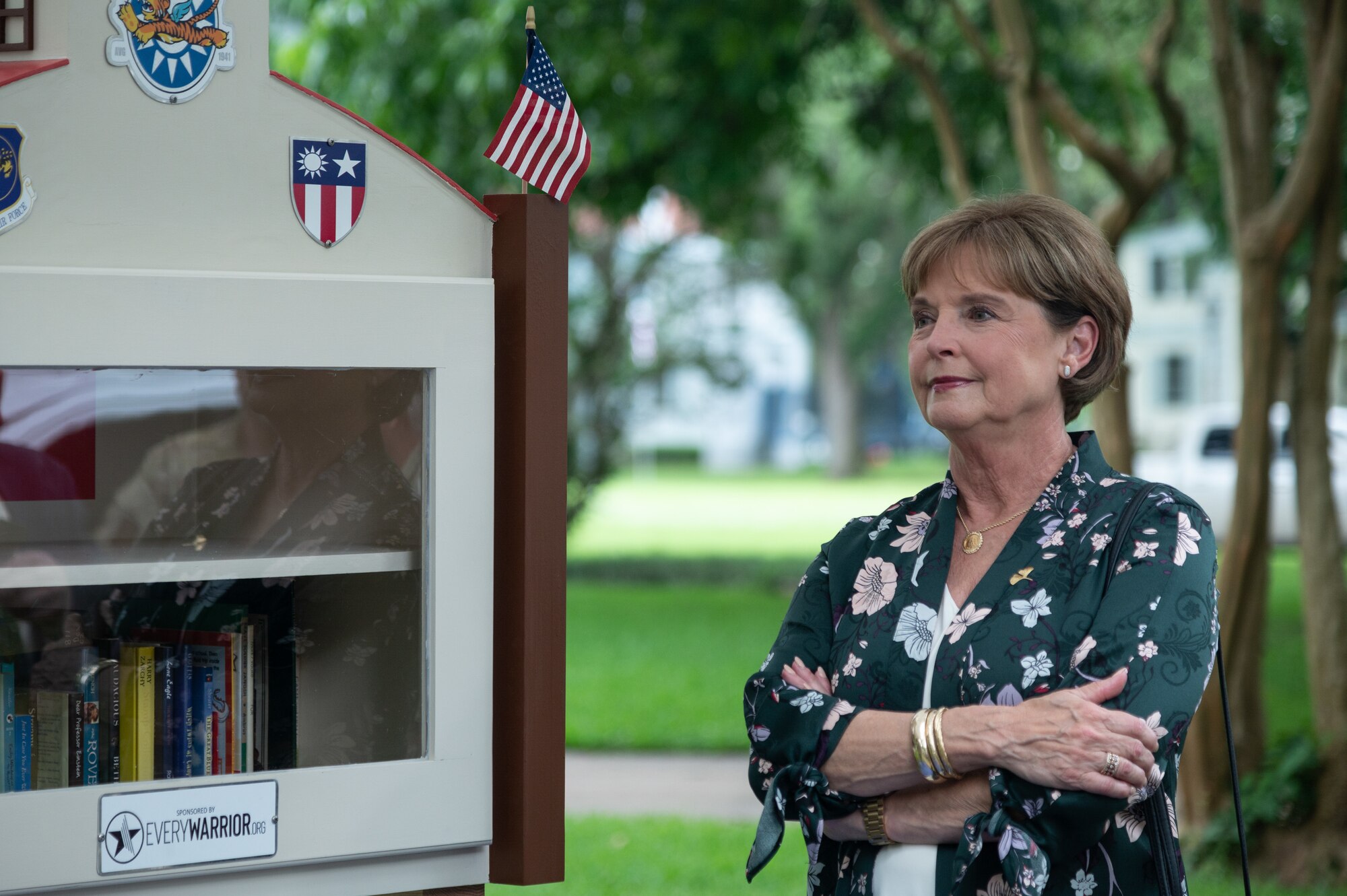 Nell Calloway, president of the Chennault Museum, stands next to the new community book exchange box at Barksdale Air Force Base, June 8, 2021. Calloway is the granddaughter of Lt. Gen. Claire Chennault, to whom the book exchange box is dedicated.