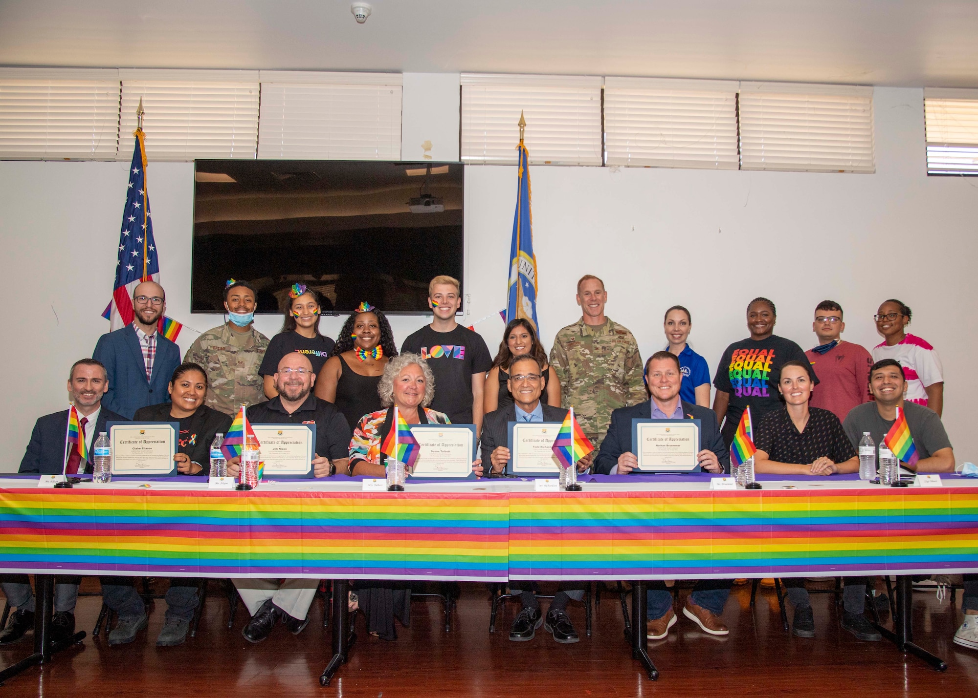 Discussion panel members, volunteers and U.S. Air Force Col. Benjamin Jonsson, 6th Air Refueling Wing commander, gather for a photo at an LGBTQ+ Pride Month luncheon at MacDill Air Force Base, Florida, June 10, 2021.