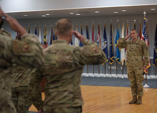 U.S. Air Force Maj, Michael Olson, incoming 14th Security Forces Squadron commander, salutes his new unit during a change of command ceremony, June 11, 2021, on Columbus Air Force Base, Miss. The 14th SFS is responsible for wing resource protection valued at over $340 million, crime prevention, unit security programs and combat arms. (U.S. Air Force photo by Airman 1st Class Jessica Haynie)