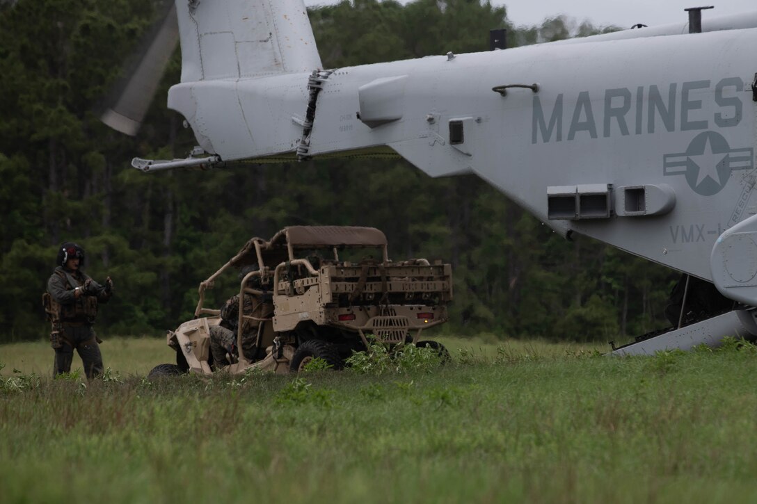 U.S. Marines with 1st Battalion, 2d Marine Regiment (1/2), 2d Marine Division, load a Utility Task Vehicle on a CH-53K King Stallion at Camp Lejeune, N.C., June 10, 2021. In support of Marine Operational Test and Evaluation Squadron 1, Marines with 1/2 executed an air assault operation to test the capabilities of the CH-53K King Stallion, the U.S. Marine Corps’ newest heavy-lift helicopter. (U.S. Marine Corps photo by Lance Cpl. Reine Whitaker)
