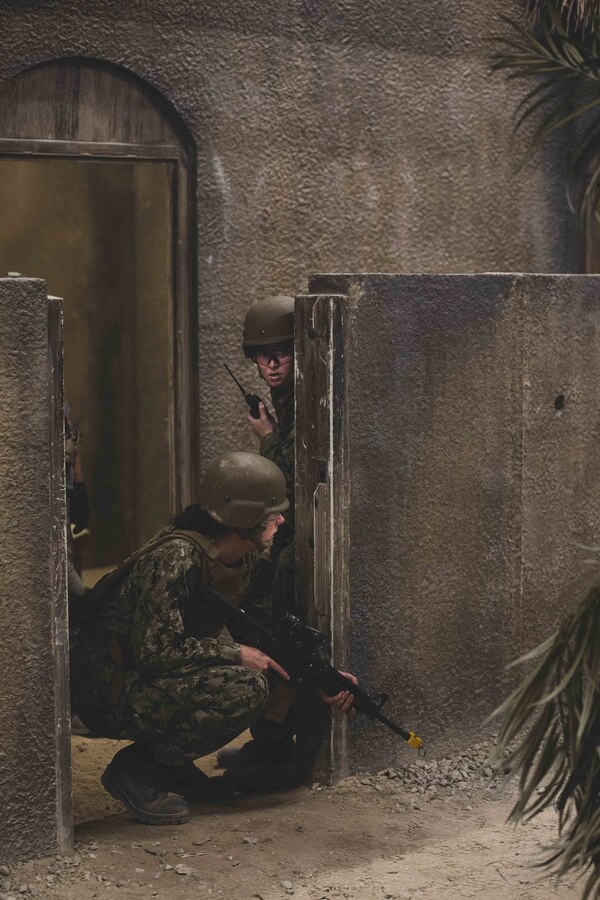 U.S. Naval Academy midshipmen provide security at the Infantry Immersion Trainer during Professional Training of Midshipmen (PROTRAMID) on Camp Lejeune, N.C., June 10, 2021.