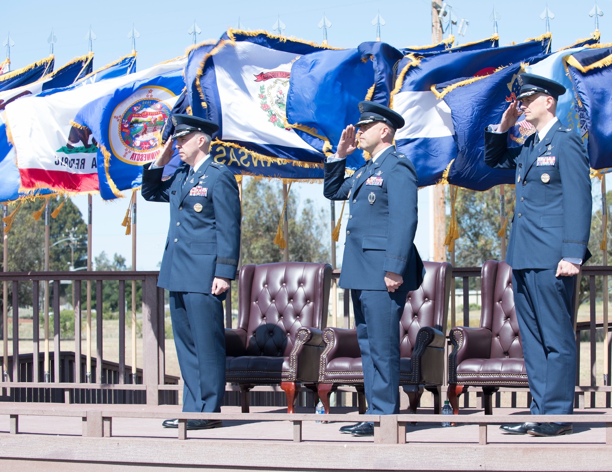 Lt. General Stephen N. Whiting, Space Operations Command commander and presiding officer, Col. Anthony J. Mastalir, outgoing Space Launch Delta 30 commander and Col. Long, Space Launch Delta 30 commander, salute Vandenberg members during a change of command ceremony on June 11, 2021, Vandenberg Space Force Base, Calif. As the new commander of SLD 30, Long will command spacelift and range operations in support of national and combatant commander requirements, and support operational and developmental missile system testing for the Department of Defense. (U.S. Space Force photo by Airman 1st Class Rocio Romo)