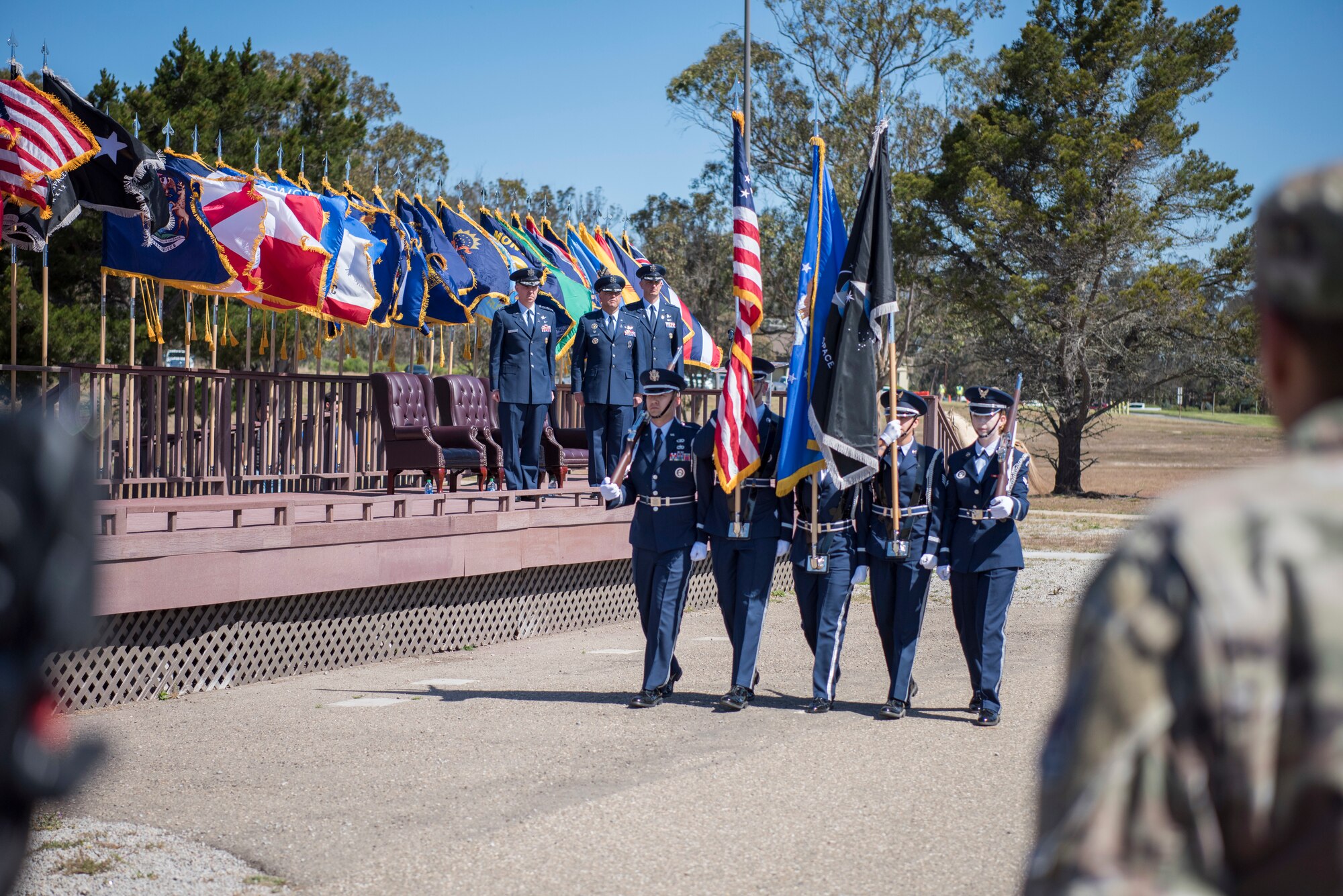 Vandenberg Honor Guard members present the colors during the change of command ceremony, June 11, 2021, Vandenberg Space Force Base, Calif. During the ceremony, Col. Robert A. Long assumed command of SLD 30 and the Western Launch and Test Range. (U.S. Space Force photo by Airman 1st Class Tiarra Sibley)