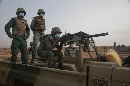 Members of the Royal Moroccan Armed Forces fire a Mk19 Grenade launcher assault down range in a live fire training during Exercise African Lion near the city of Tantan, Morocco, June 9, 2021.