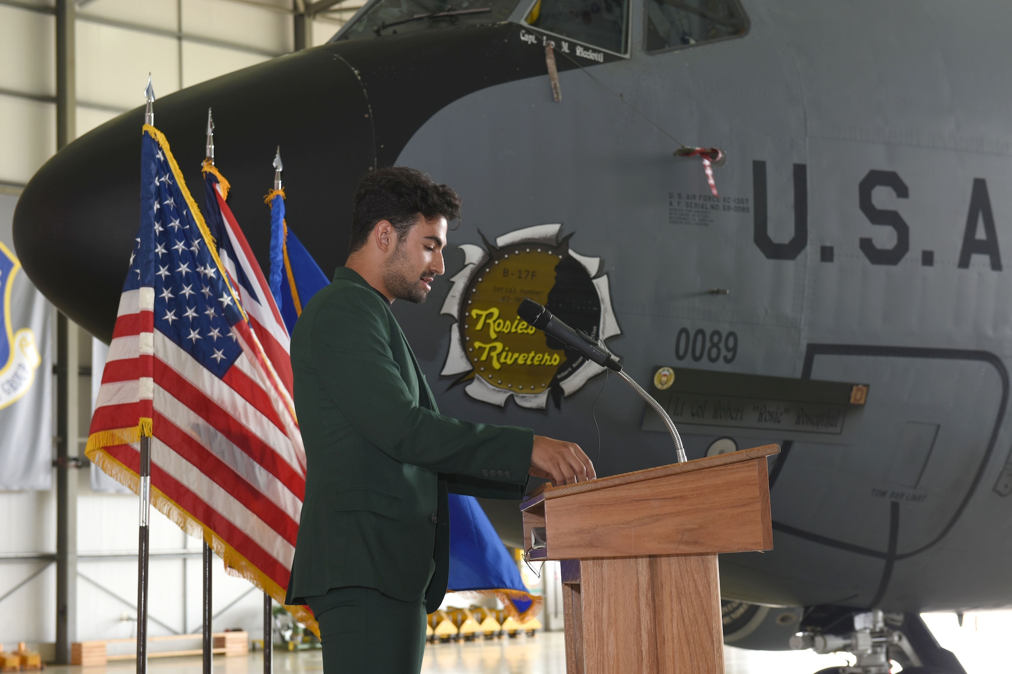 Sam Rosenthal, grandson of legendary World War II pilot Lt. Col. Robert “Rosie” Rosenthal, speaks at a nose art unveiling ceremony at Royal Air Force Mildenhall, England, June 10, 2021. The nose art, “Rosie’s Riveters,” was named in honor of Sam’s grandfather, who was assigned to the 418th Bomb Squadron, 100th Bomb Group, from September 1943 to September 1944 at Thorpe Abbotts, Diss, England. Sam and his father, Dan, visited RAF Mildenhall to attend the ceremony. (U.S. Air Force photo by Karen Abeyasekere)