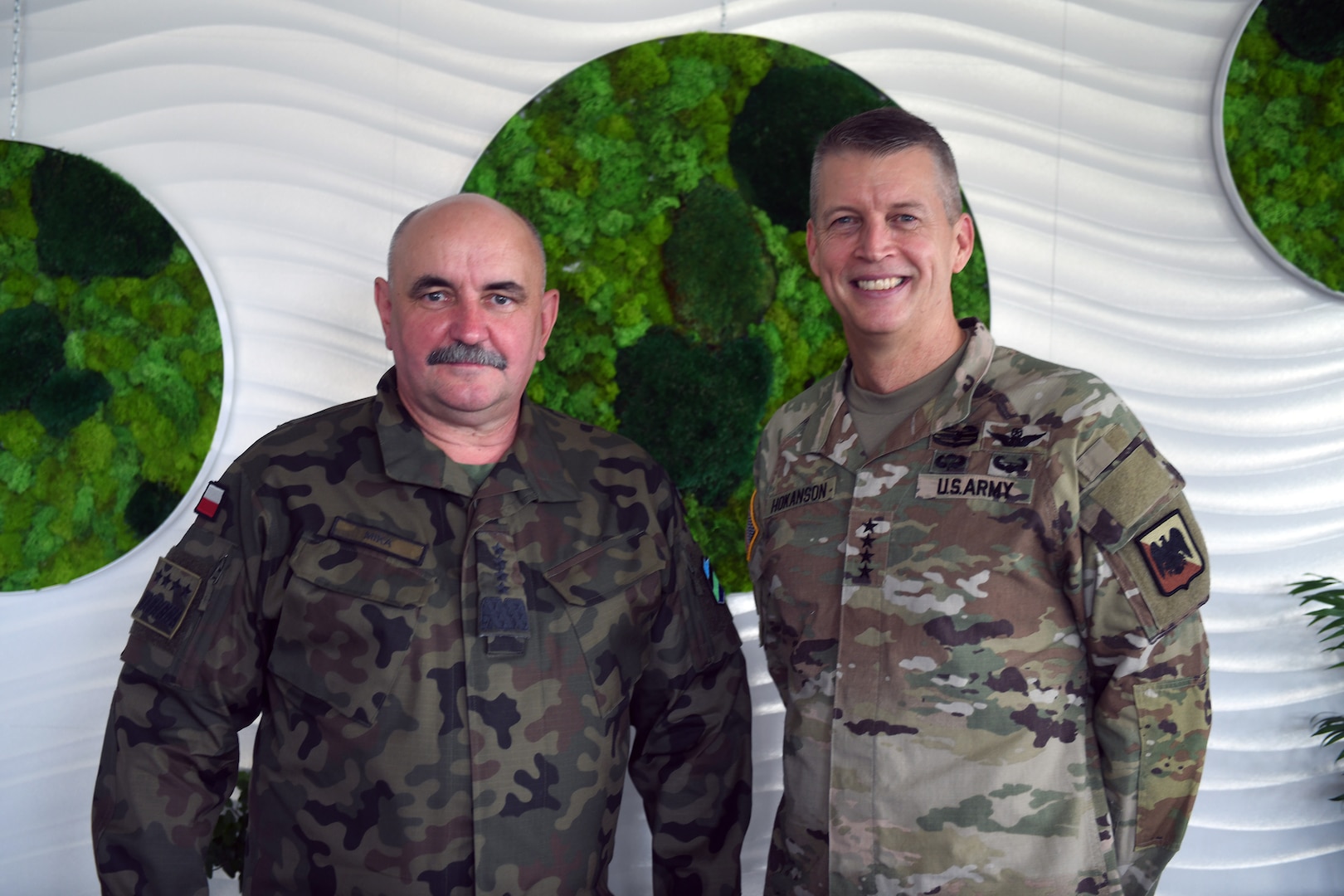 Army Gen. Daniel Hokanson, chief, National Guard Bureau, with General Commander of the Branches of the Polish Armed Forces, Gen. Jaroslaw Mika, during Hokanson's visit to National Guard troops, Powidz, Poland, June 12, 2021