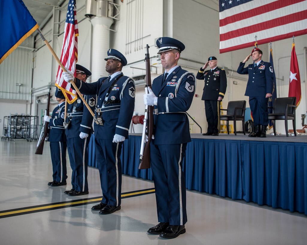 The 123rd Airlift Wing Honor Guard presents the colors during a ceremony at the Kentucky Air National Guard Base in Louisville, Ky., June 12, 2021, to bestow the Airman’s Medal to Master Sgt. Daniel Keller, a combat controller in the 123rd Special Tactics Squadron. Keller earned the award for heroism in recognition of his actions to save human life following a traffic accident near Louisville in 2018. (U.S. Air National Guard photo by Tech. Sgt. Joshua Horton)