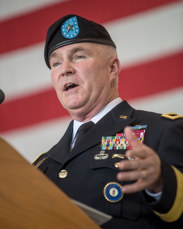 Brig. Gen. Hal Lamberton, the adjutant general for the Commonwealth of Kentucky, speaks at a ceremony to bestow the Airman’s Medal on Master Sgt. Daniel Keller, a combat controller in the 123rd Special Tactics Squadron, at the Kentucky Air National Guard Base in Louisville, Ky., June 12, 2021. Keller earned the award for heroism in recognition of his actions to save human life following a traffic accident near Louisville in 2018. (U.S. Air National Guard photo by Tech. Sgt. Joshua Horton)