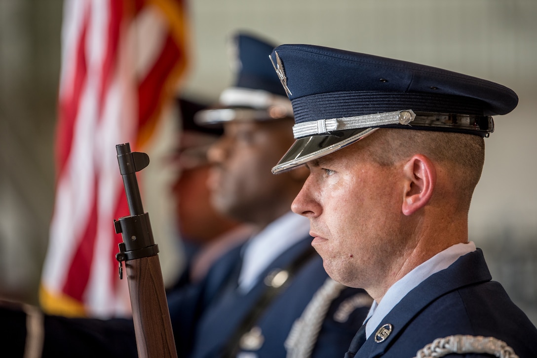 The 123rd Airlift Wing Honor Guard presents the colors during a ceremony at the Kentucky Air National Guard Base in Louisville, Ky., June 12, 2021, to bestow the Airman’s Medal to Master Sgt. Daniel Keller, a combat controller in the 123rd Special Tactics Squadron. Keller earned the award for heroism in recognition of his actions to save human life following a traffic accident near Louisville in 2018. (U.S. Air National Guard photo by Tech. Sgt. Joshua Horton)