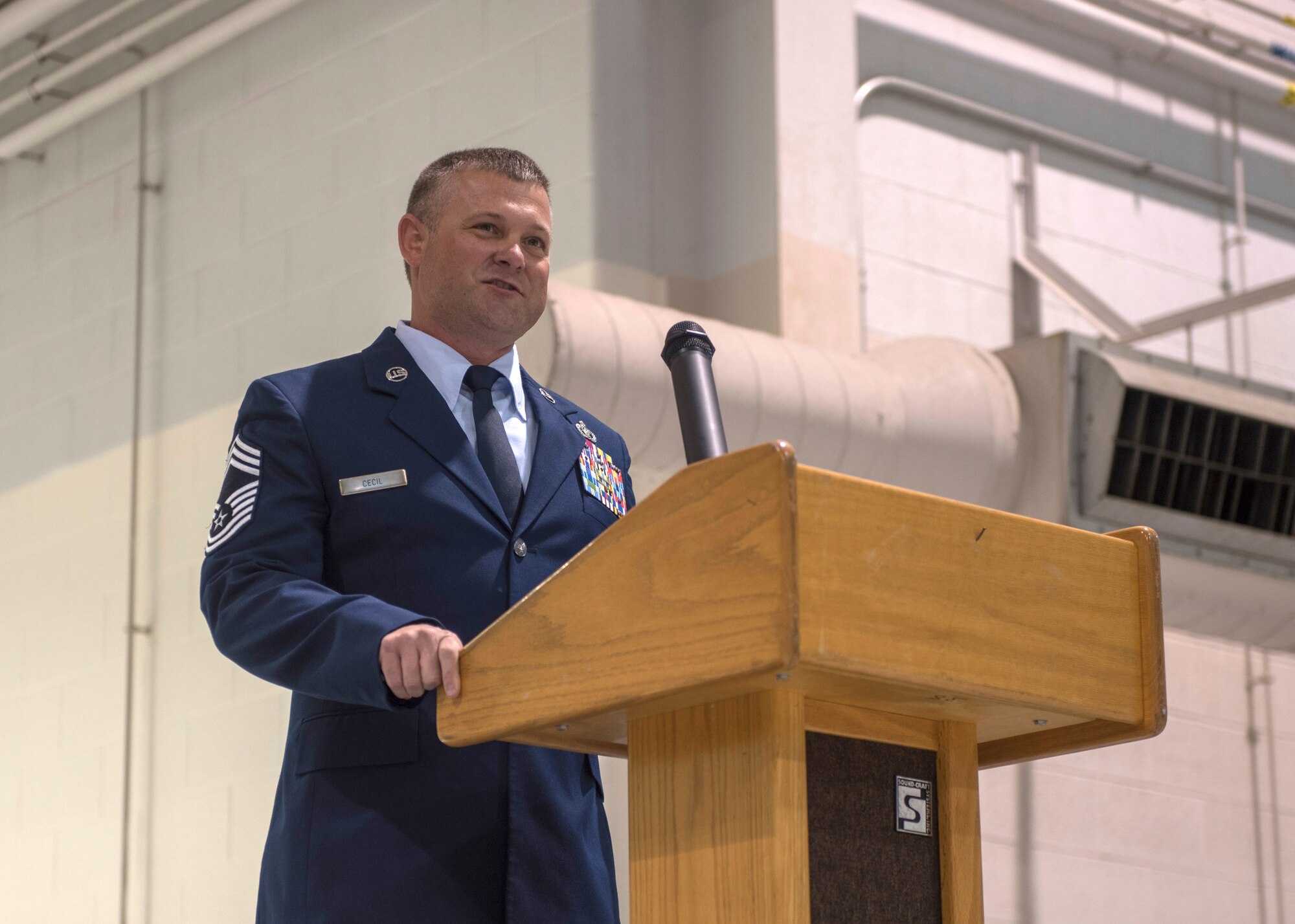 Chief Master Sgt. Shaun P. Cecil, chief enlisted manager for the 123rd Civil Engineer Squadron, speaks to audience members during his retirement ceremony April 10, 2021, at the Kentucky Air National Guard Base in Louisville, Ky. Cecil's career spanned 24 years. (U.S. Air National Guard photo by Staff Sgt. Clayton Wear)