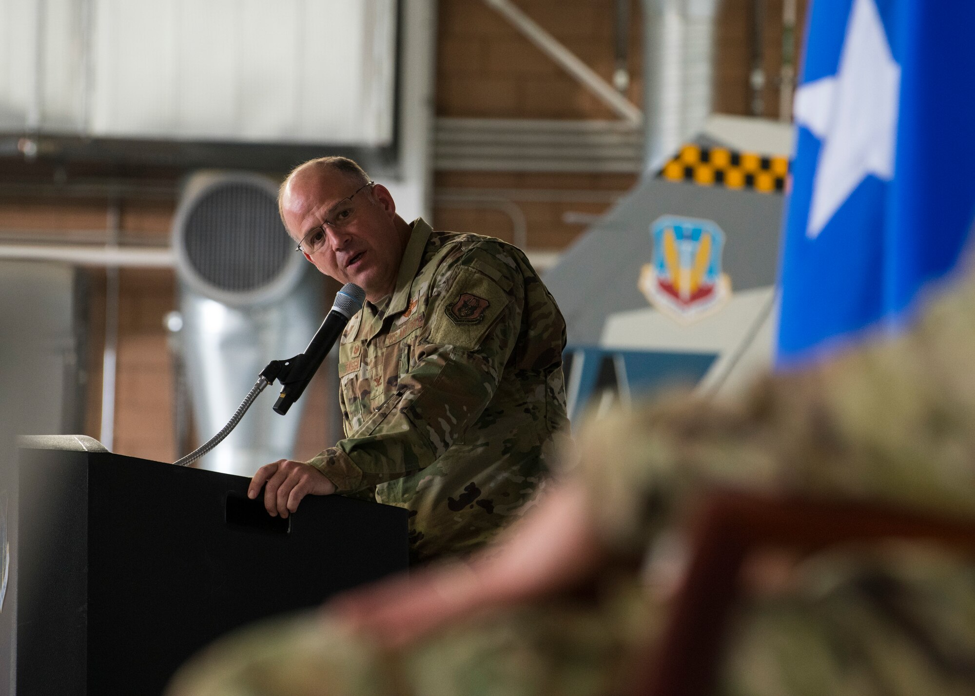 Col. Sean Rassas, 926th Wing commander, shares remarks during the 926th Wing change of command ceremony, June 13, 2021 at Nellis Air Force Base, Nevada. The 926th Wing is comprised of over 1,500 unit reservists who are classically associated in Total Force Integration throughout Air Combat Command. (U.S. Air Force photo by Senior Airman Brett Clashman)