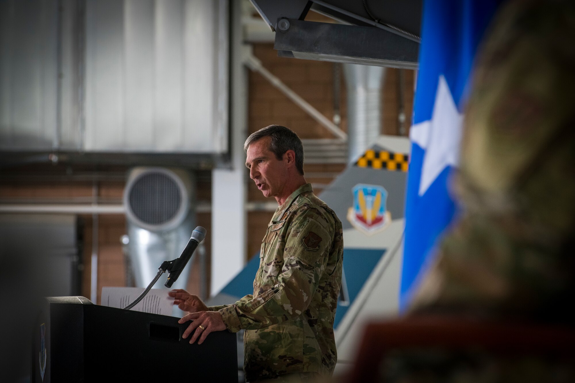 Maj. Gen. Bryan Radliff, 10th Air Force commander, shares remarks during the 926th Wing change of command ceremony, June 13, 2021 at Nellis Air Force Base, Nevada. The 10th Air Force operates across multiple domains that include all fighter, bomber, special operations, rescue, airborne warning and control, and combat operations. (U.S. Air Force photo by Senior Airman Brett Clashman)