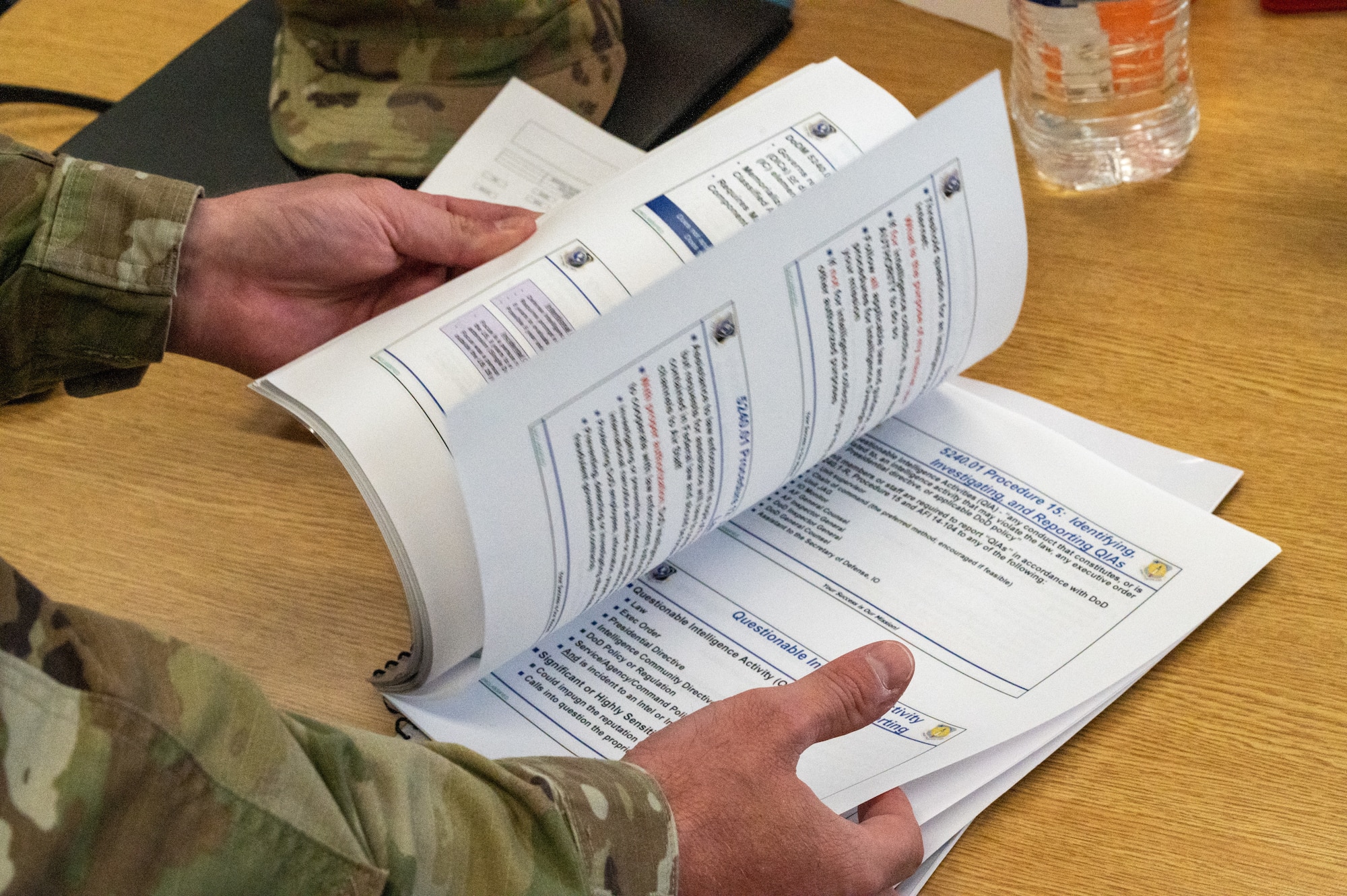 Tech. Sgt. Russell Metts, 51st Civil Engineer Squadron structural supervisor, references a guide for small unmanned aircraft systems at Osan Air Base, Republic of Korea, June 6, 2021. Operators must conduct training every 30-, 60-, and 90-day intervals to maintain their proficiency and requirements. (U.S. Air Force photo by Tech. Sgt. Nicholas Alder)