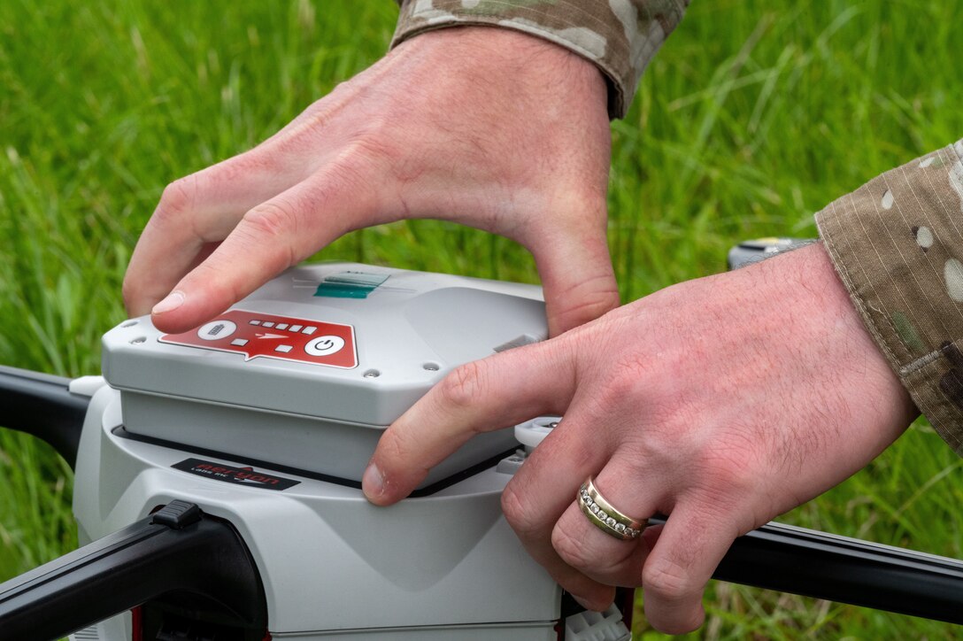 Tech. Sgt. Russell Metts, 51st Civil Engineer Squadron structural supervisor, changes the battery on an Aeryon SkyRanger small unmanned aircraft system at Osan Air Base, Republic of Korea, June 6, 2021. Operators must regularly keep the batteries charged to maintain adequate flight time for airfield assessment flights. (U.S. Air Force photo by Tech. Sgt. Nicholas Alder)