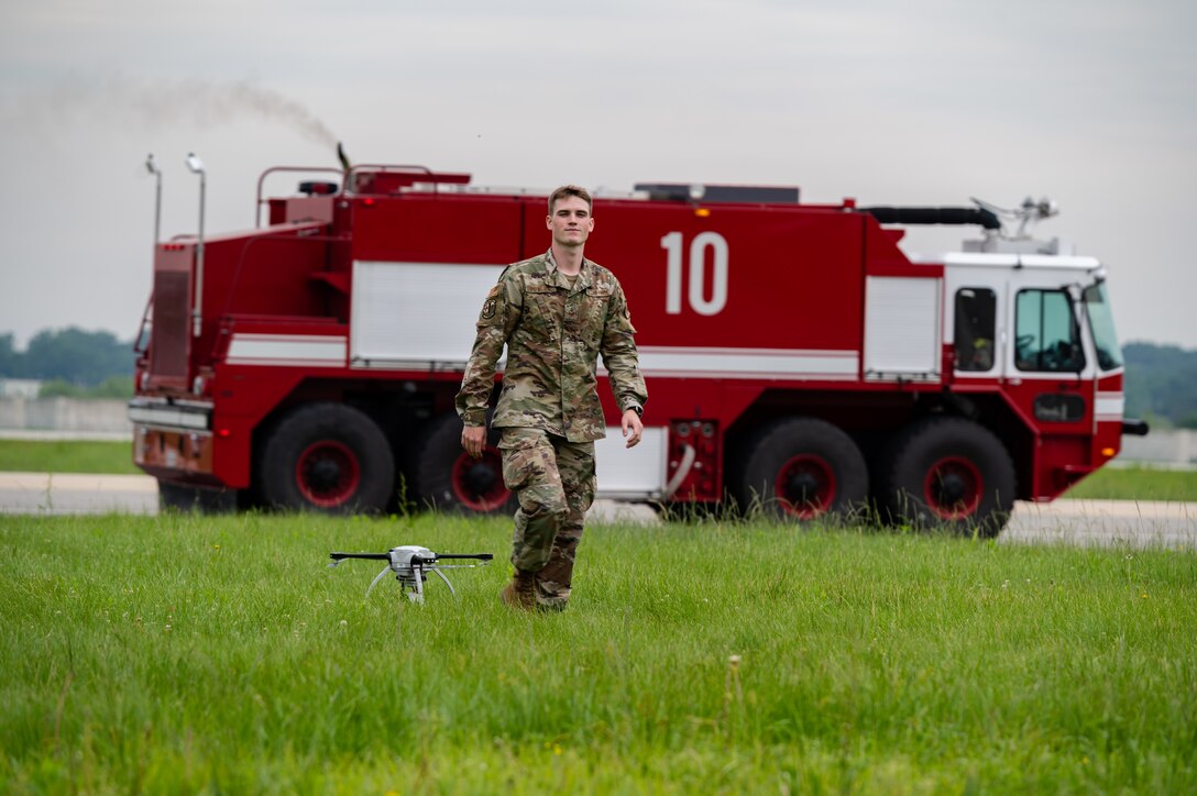 Staff Sgt. Nathan Powers, 51st Civil Engineer Squadron construction inspector technician, inspects small unmanned aircraft systems after landing at Osan Air Base, Republic of Korea, June 6, 2021. Airmen operate these aerial systems as part of their quarterly Rapid Airfield Damage Assessment System training. (U.S. Air Force photo by Tech. Sgt. Nicholas Alder)