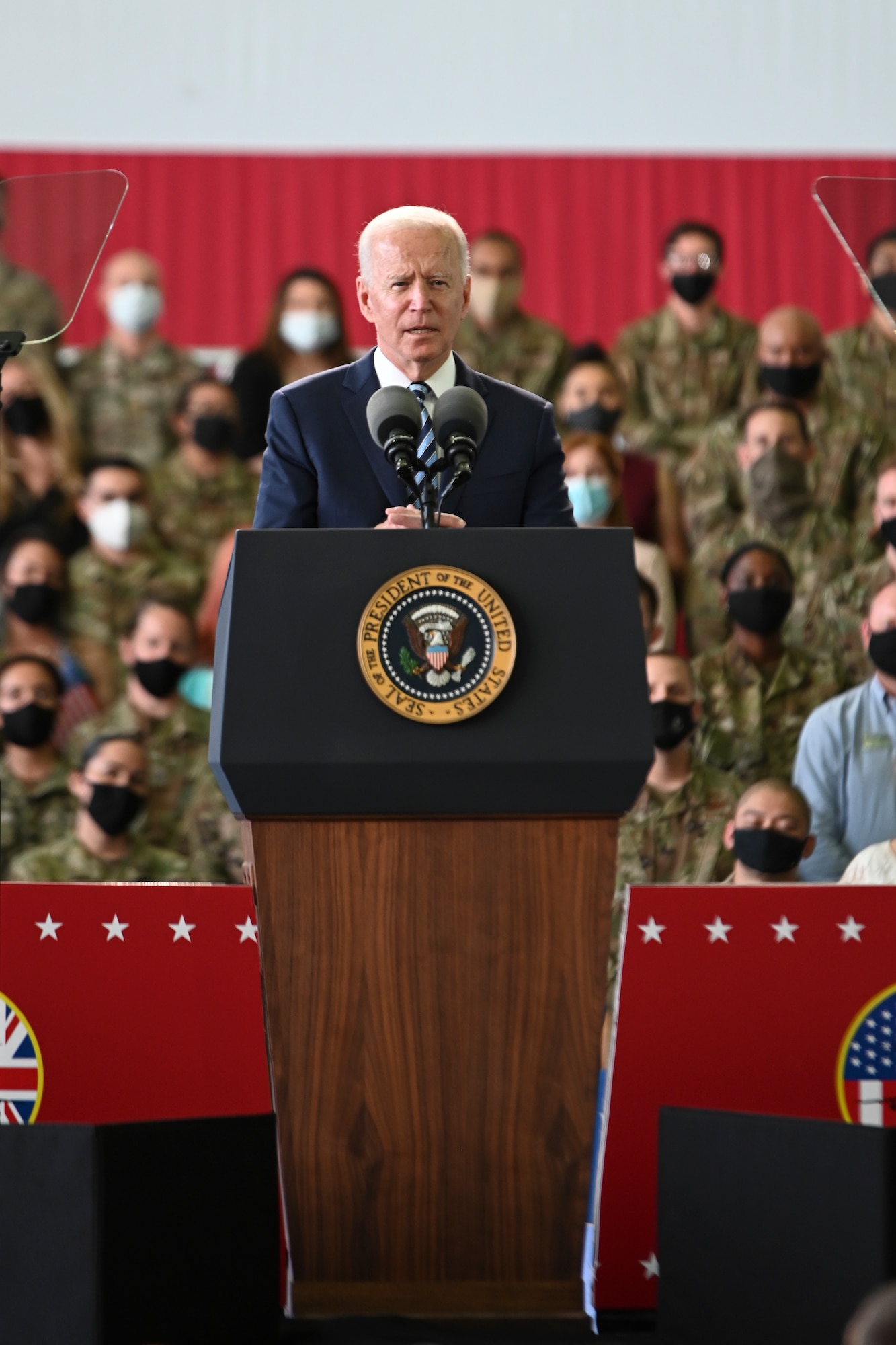 President Joe Biden stands at his podium at Royal Air Force Mildenhall, United Kingdom, June 9, 2021.