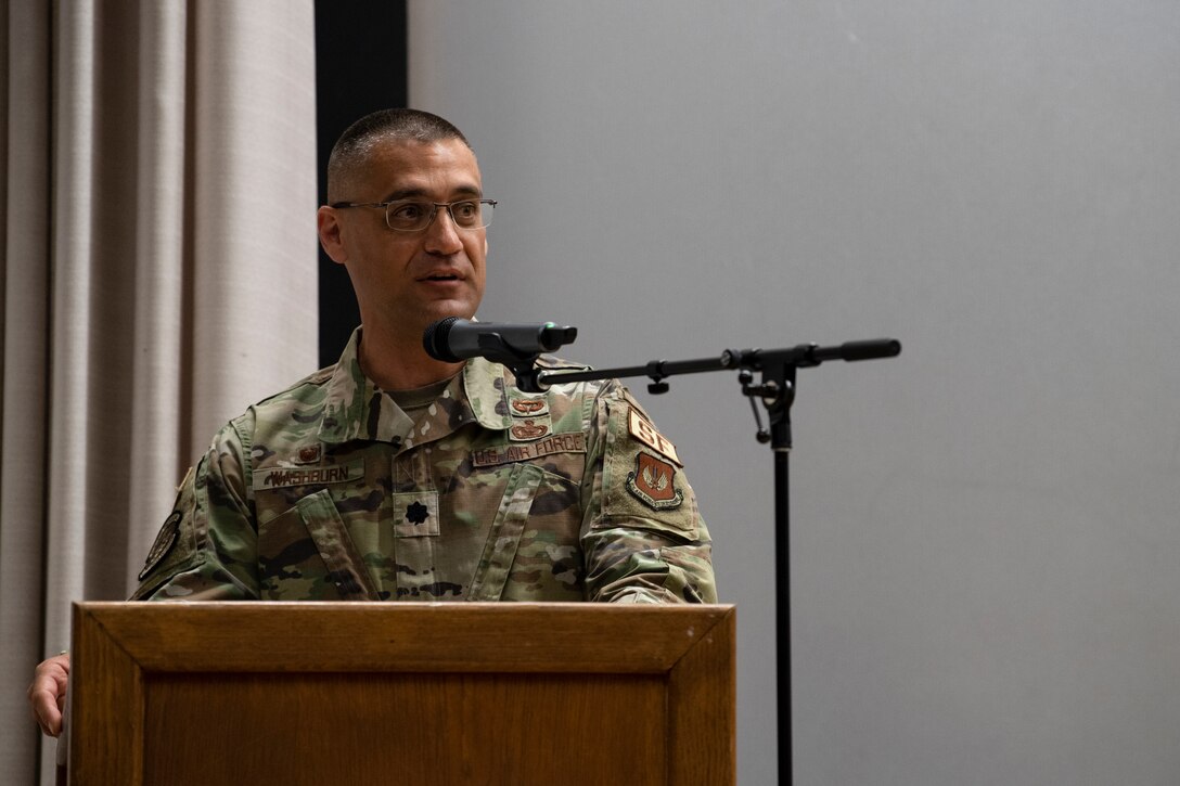 U.S. Air Force 52nd Security Forces Squadron commander speaks during a ceremony.