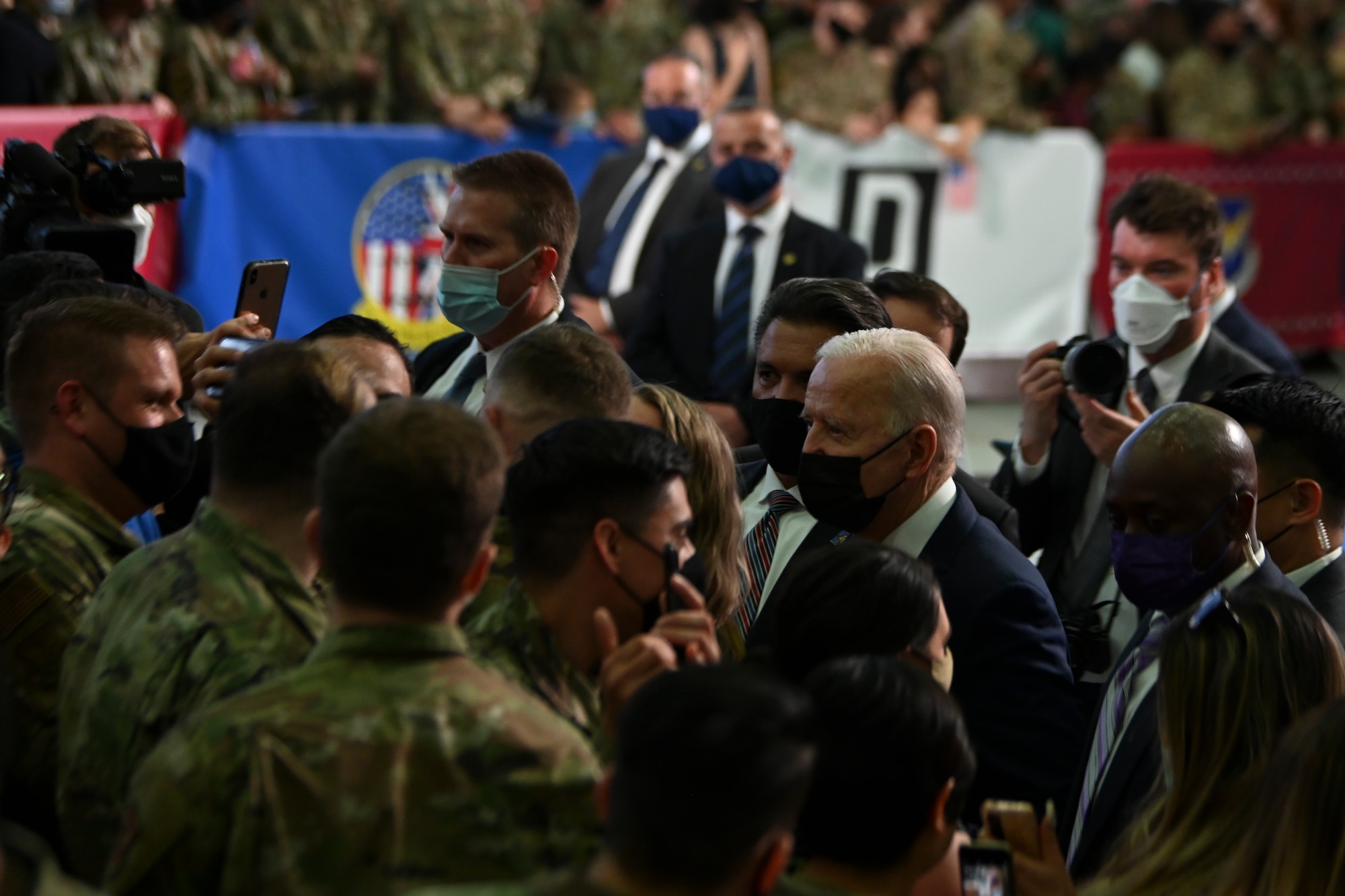 President Joe Biden shakes hands with members of the tri-base area at Royal Air Force Mildenhall, United Kingdom, June 4, 2021.