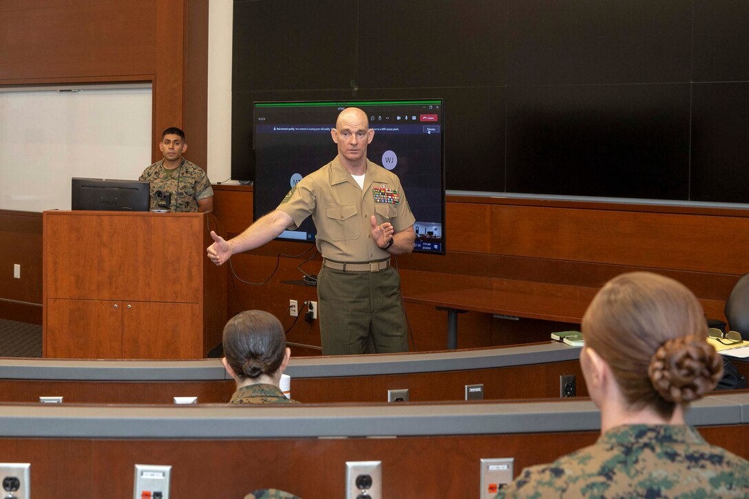 The 19th Sergeant Major of the Marine Corps, Sgt. Maj. Troy E. Black, addresses the members of the Sustaining the Transformation Writing Team at Marine Corps Base Quantico, Va, June 7, 2021. The Sergeant Major of the Marine Corps gave opening comments to the writing team as they work through what need to be included in future iterations. The goal is to develop the next version of Sustaining the Transformation that reflects the current state of the Marine Corps and transcends future generations. (U.S. Marine Corps photo by Sgt. Victoria Ross)