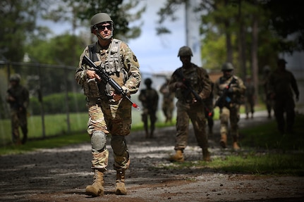 Staff Sgt. Jacob Tapley, 159th Civil Engineer Squadron, takes part in dismounted patrol tactics as part of basic combat skills training at the Air Dominance Center in Savannah, Ga., June 7, 2021. The training was led by the 159th Security Forces Squadron as part of unit operations readiness.