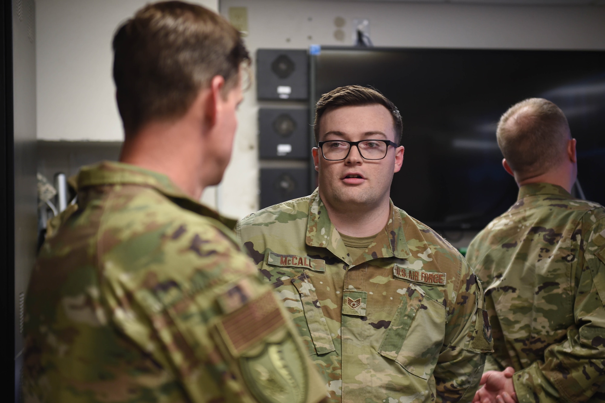 Staff sergeant Micah McCall talks with colonel Russell Cook