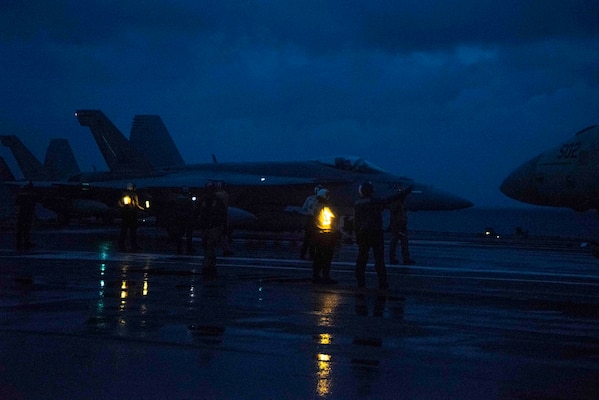 An F/A-18E Super Hornet attached to the Eagles of Strike Fighter Squadron (VFA) 115 launches from the flight deck.