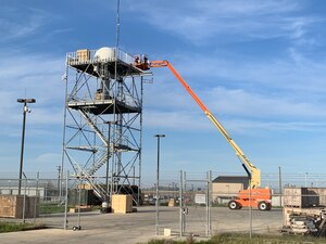L3 Harris Communication Systems-West personnel make final touches to the remote equipment group of the Distributed Common Ground System Distributed Surface Asset (DDSA) on Beale Air Force Base