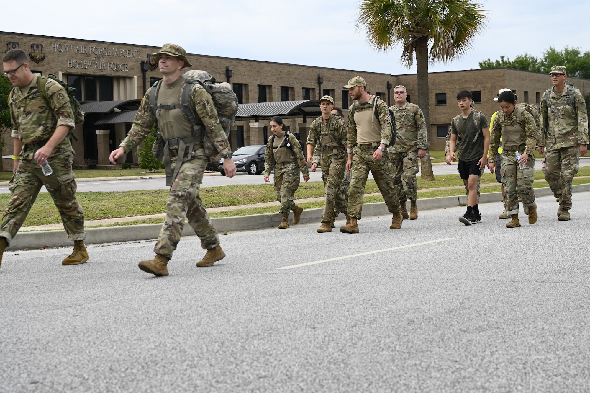 Members from the U.S. Air Force, U.S. Army, Royal Danish Air Force and other coalition partners participate in the Danish Contingency (DANCON) ruck march at Shaw Air Force Base, S.C., June 5, 2021. Traditionally, RDAF members host 25KM (15.5 miles) DANCON ruck marches at the conclusion of team deployments in the Middle East and other locations around the globe. RDAF members recently deployed to Shaw Air Force Base to work side by side with Airmen from the 727 Expeditionary Air Control Squadron, “Kingpin,” and this event marks the first DANCON march held on U.S. soil.