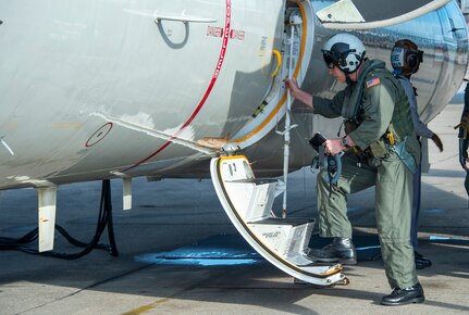 Rear Adm. John F. Meier, Commander, Naval Air Force Atlantic, boards an E-2D Hawkeye,