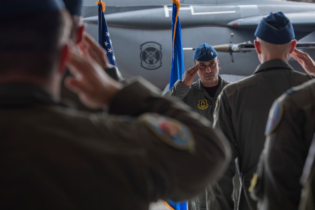 Lt. Col. Sriram Krishnan, incoming 307th Fighter Squadron commander, gives first salute to the squadron during the 307th FS change of command ceremony at Seymour Johnson Air Force Base, North Carolina, June 11, 2021.