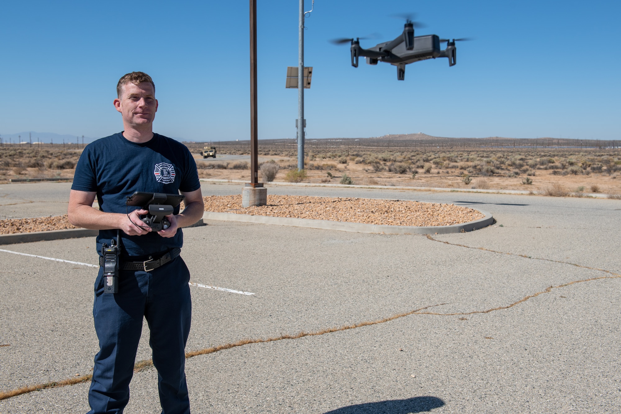 A digital tablet displays an image of an exercise scenario during an 812th Civil Engineering Squadron interoperability exercise on North Base at Edwards Air Force Base, California, June 4.