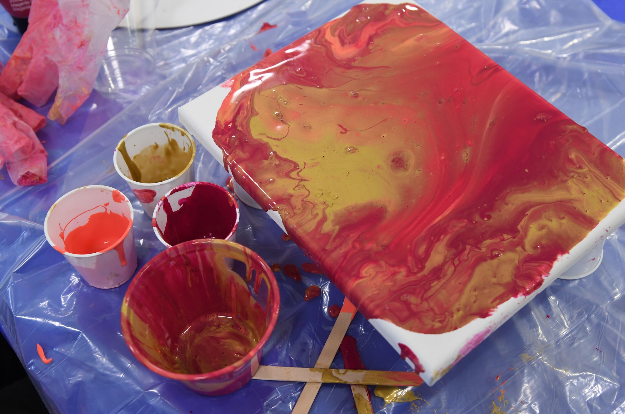 An acrylic painted canvas is displayed during the Keesler Youth Center fine arts camp at Keesler Air Force Base, Mississippi, June 10, 2021. The youth center offers a variety of camps throughout the summer for children of military personnel. (U.S. Air Force photo by Kemberly Groue)