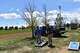 Members play corn hole during picnic