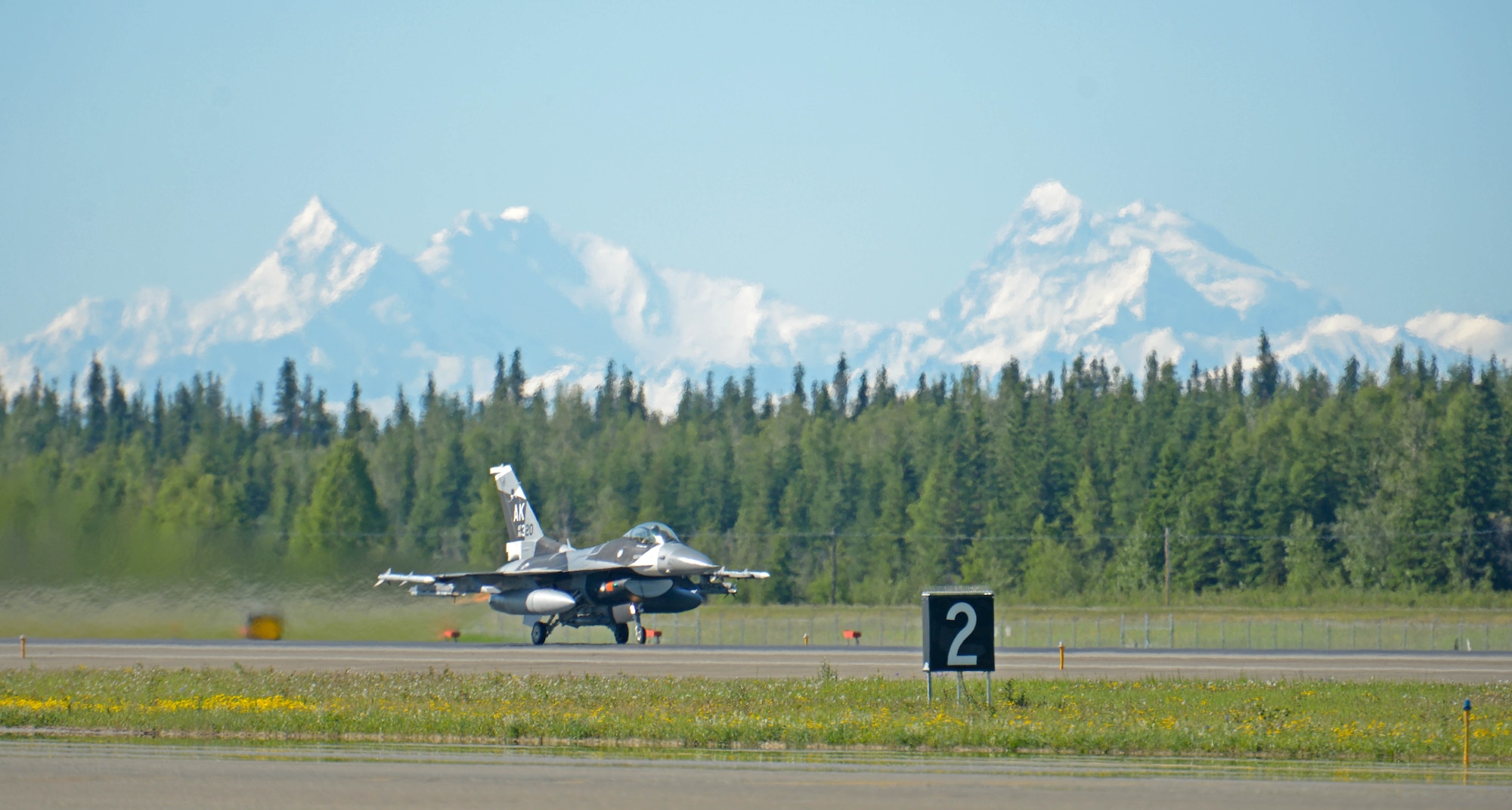An F-16 Fighting Falcon assigned to the 18th Aggressor Squadron takes off during RED FLAG-Alaska 21-2 on Eielson Air Force Base, Alaska, June 14, 2021.