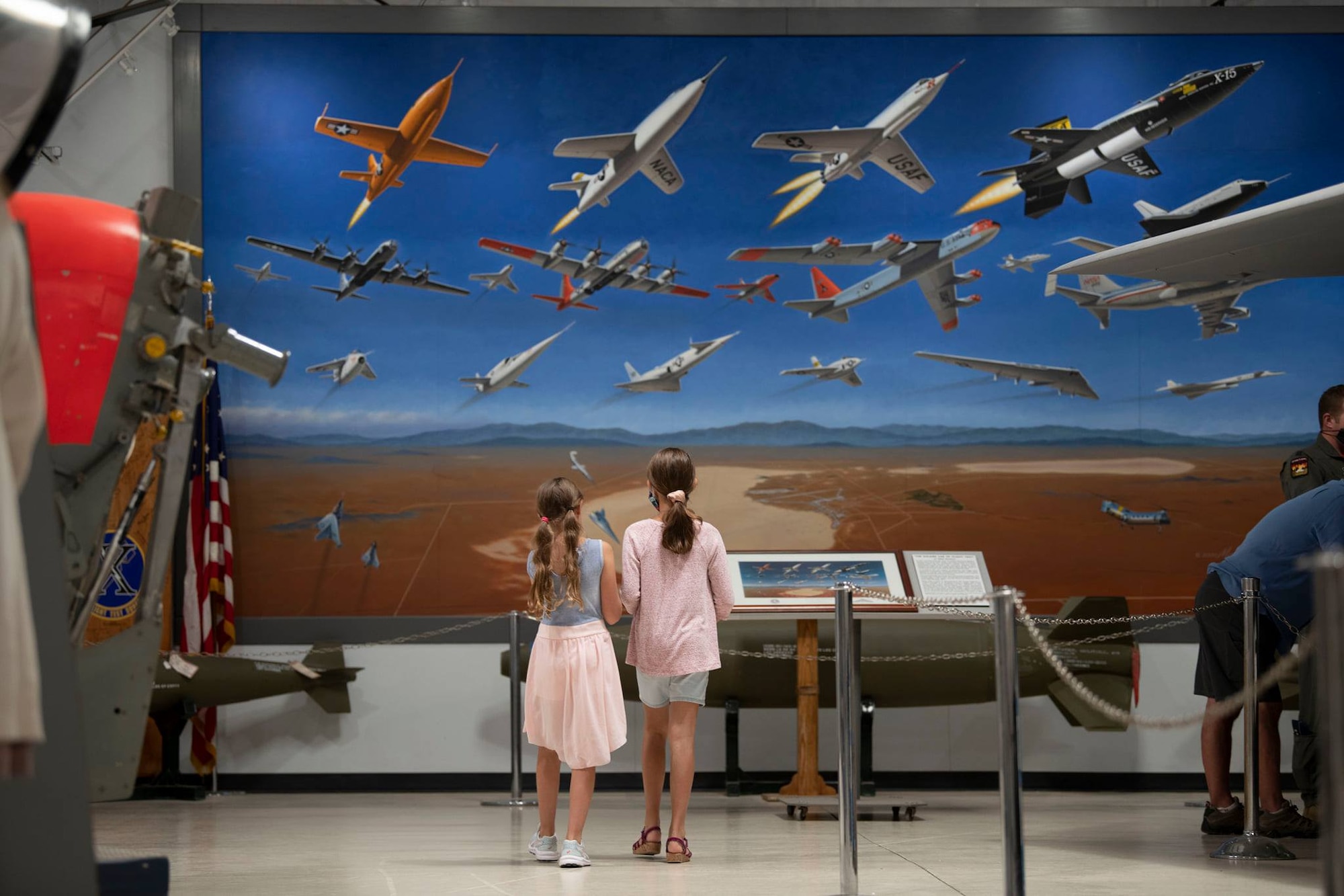 kids looking at a museum