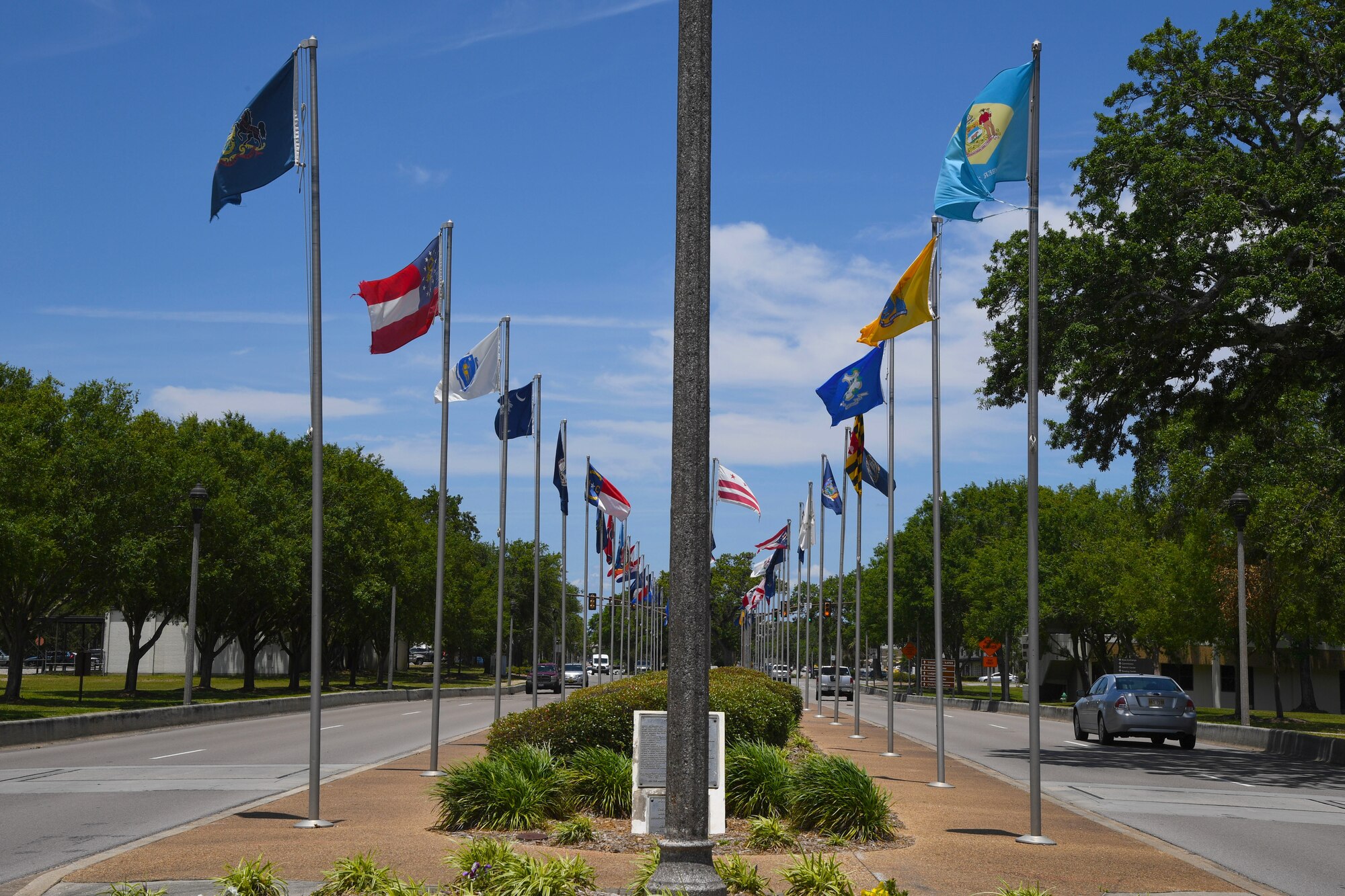 The Boulevard of Flags was established on Oct. 4, 1988 by the John C. Stennis Chapter of the Air Force Association to represent and honor the homes of our technical training students. It includes the 50 U.S. state flags and the flags for the District of Columbia and all 5 U.S. territories and is currently maintained by the 81st Training Wing Protocol Office. The monument is a reminder today of the history of each flag and the diverse culture of the U.S. military. (U.S. Air Force photo by Kemberly Groue)