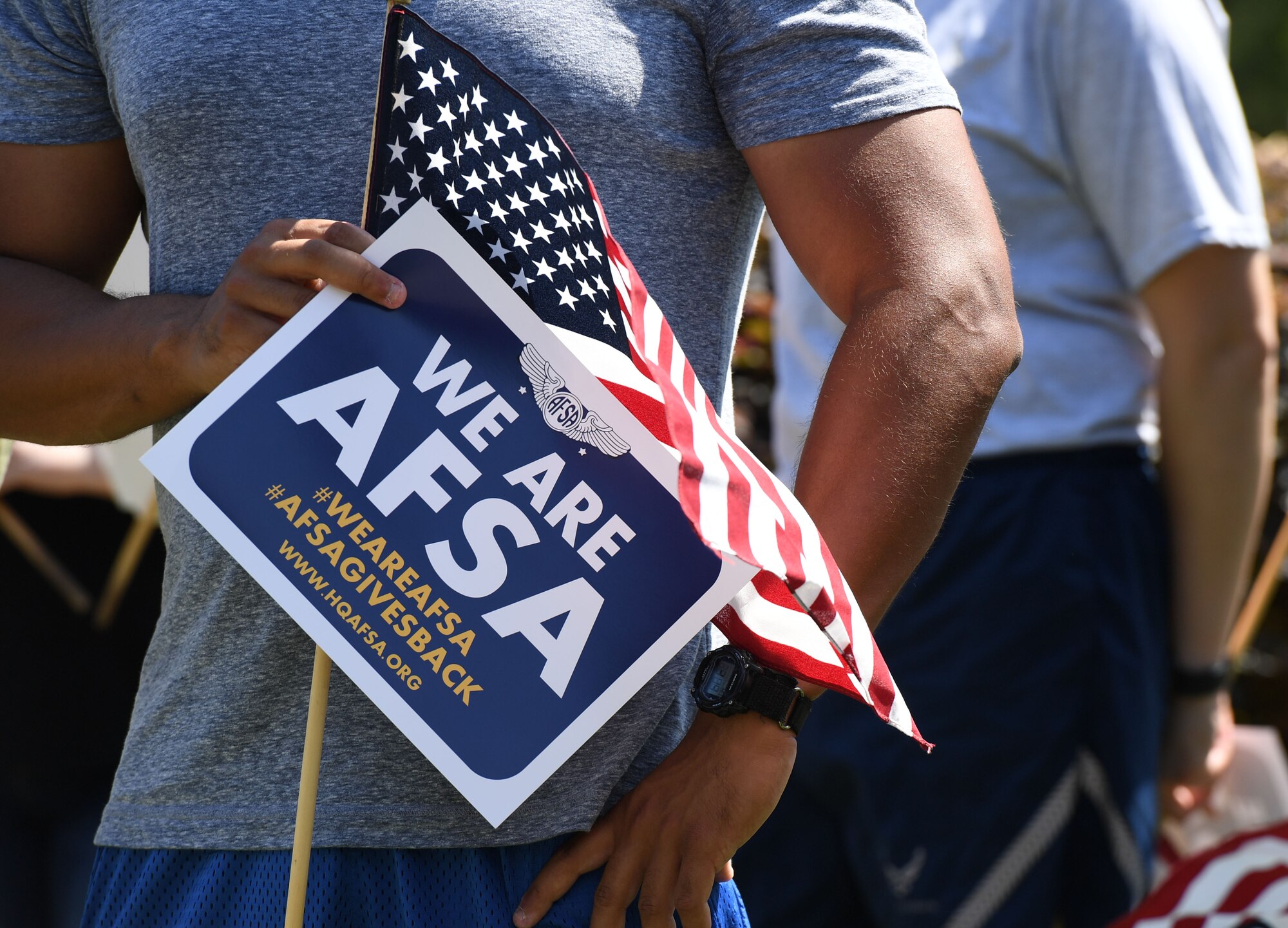 U.S. Air Force Staff Sgt. Ryan Hervey, 81st Training Support Squadron technical training enterprise supervisor and member of the Air Force Sergeants Association Chapter 652, holds a U.S. flag prior to placing flags in the ground along Larcher Blvd. at Keesler Air Force Base, Mississippi, June 11, 2021. June 14 is Flag Day, a celebration of the history of the American flag and a time to remember proper etiquette for its display. Flag Day recognizes the adoption of the Stars and Stripes as the official flag of the United States 238 years ago on June 14, 1777, by the Continental Congress meeting in Philadelphia. (U.S. Air Force photo by Kemberly Groue)