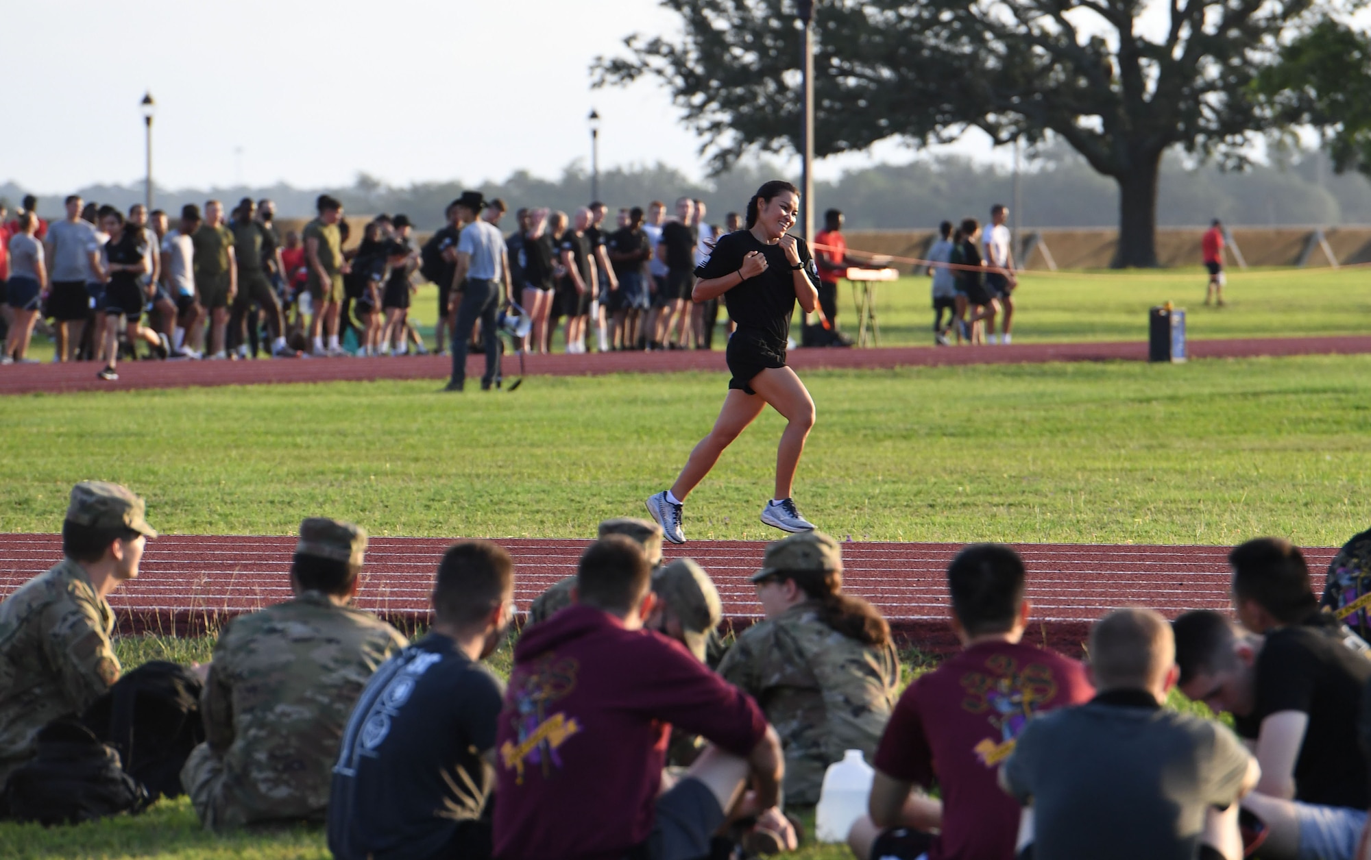 U.S. Air Force Airman 1st Class Saowalak Wester, 338th Training Squadron student, participates in the 1600 meter run during the 81st Training Group Olympics at Keesler Air Force Base, Mississippi, June 11, 2021. The event also included competitions in weight lifting, long jump, shot put and discus. (U.S. Air Force photo by Kemberly Groue)