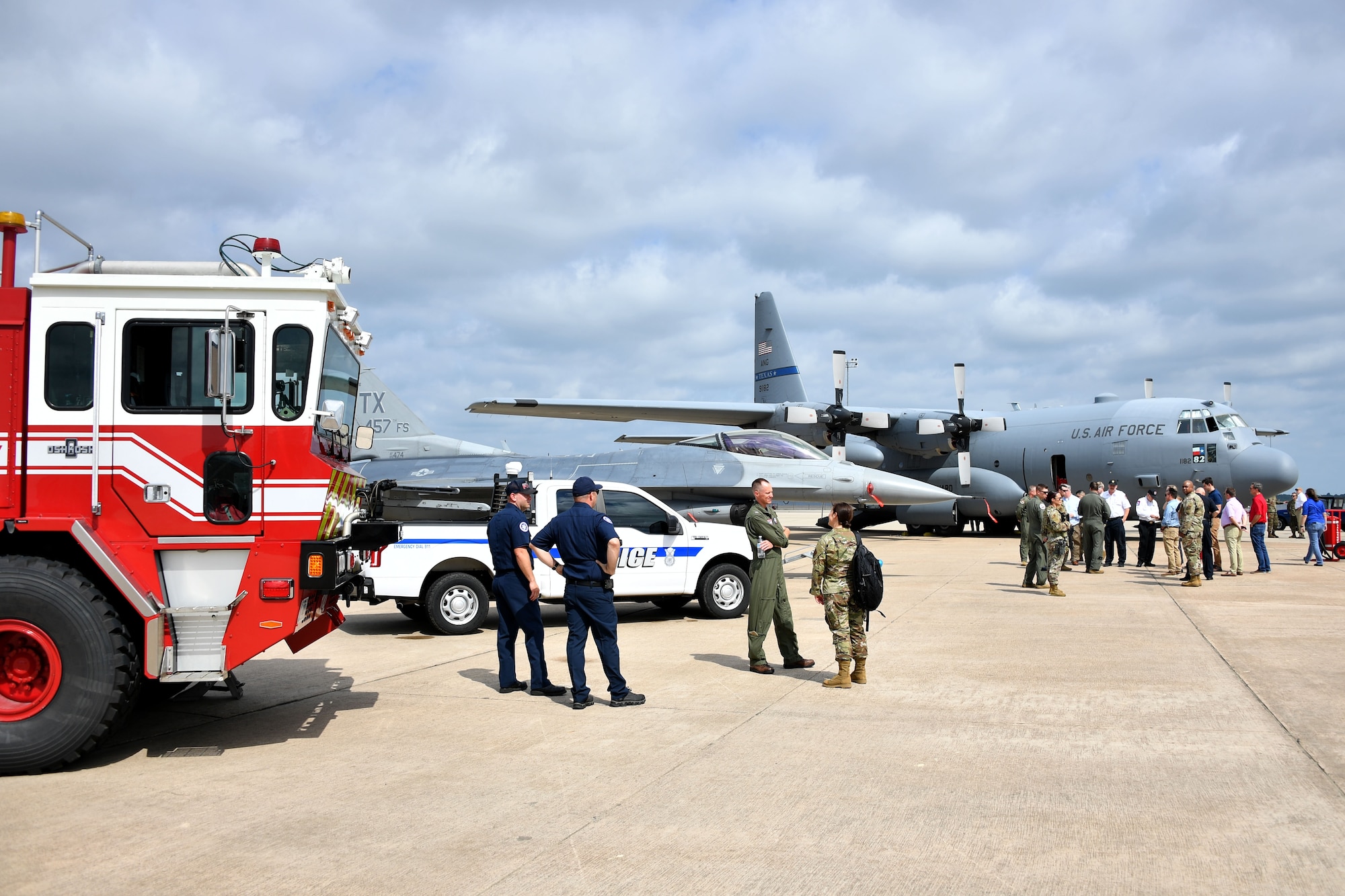 Civic leaders from the Dallas/Fort Worth area tour the designated Air Force portion of flight line during the Civic Leader Day Event held June 11, 2021, at U.S. Naval Air Station Joint Reserve Base Fort Worth, Texas. This location highlighted base fire department and 301 FW Security Forces, while featuring the 301 FW and the Texas Air National Guard 136th Airlift Wing, which personified total force integration in order to get the mission accomplished. (U.S. Air Force photo by Staff Sgt. Randall Moose)