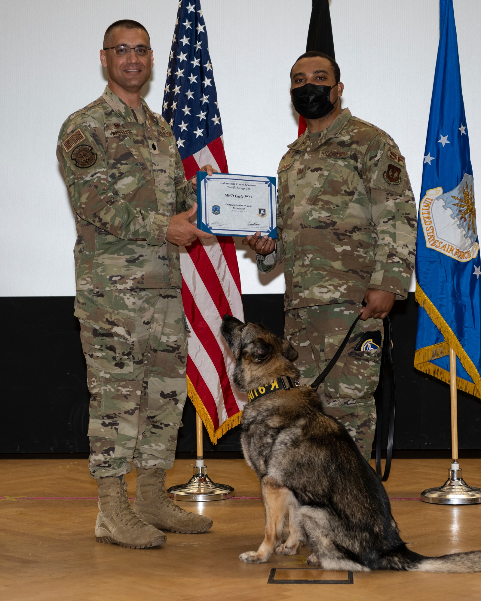 Photo of a military working dog retirement presentation.