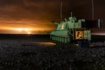 A U.S. Army M109A6 Paladin 155 mm howitzer with the Charlie Battery, 1st Battalion, 214th Field Artillery, 648th Maneuver Enhancement Brigade, Georgia Army National Guard, watches fired artillery observation rounds during Exercise African Lion 21, at the Tan-Tan Training Area, Morocco, June 13, 2021. Morocco, Tunisia and Senegal are hosting the exercise June 7-18.