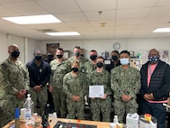 IMAGE: NORFOLK, Va. – Sailors receive their fiber maintenance technician certification at the Norfolk schoolhouse. As part of the Fiber Optics Test and Repair Program, the Norfolk schoolhouse is certified to verify proficiency in fiber repair in an effort to increase fleet self-sufficiency.
