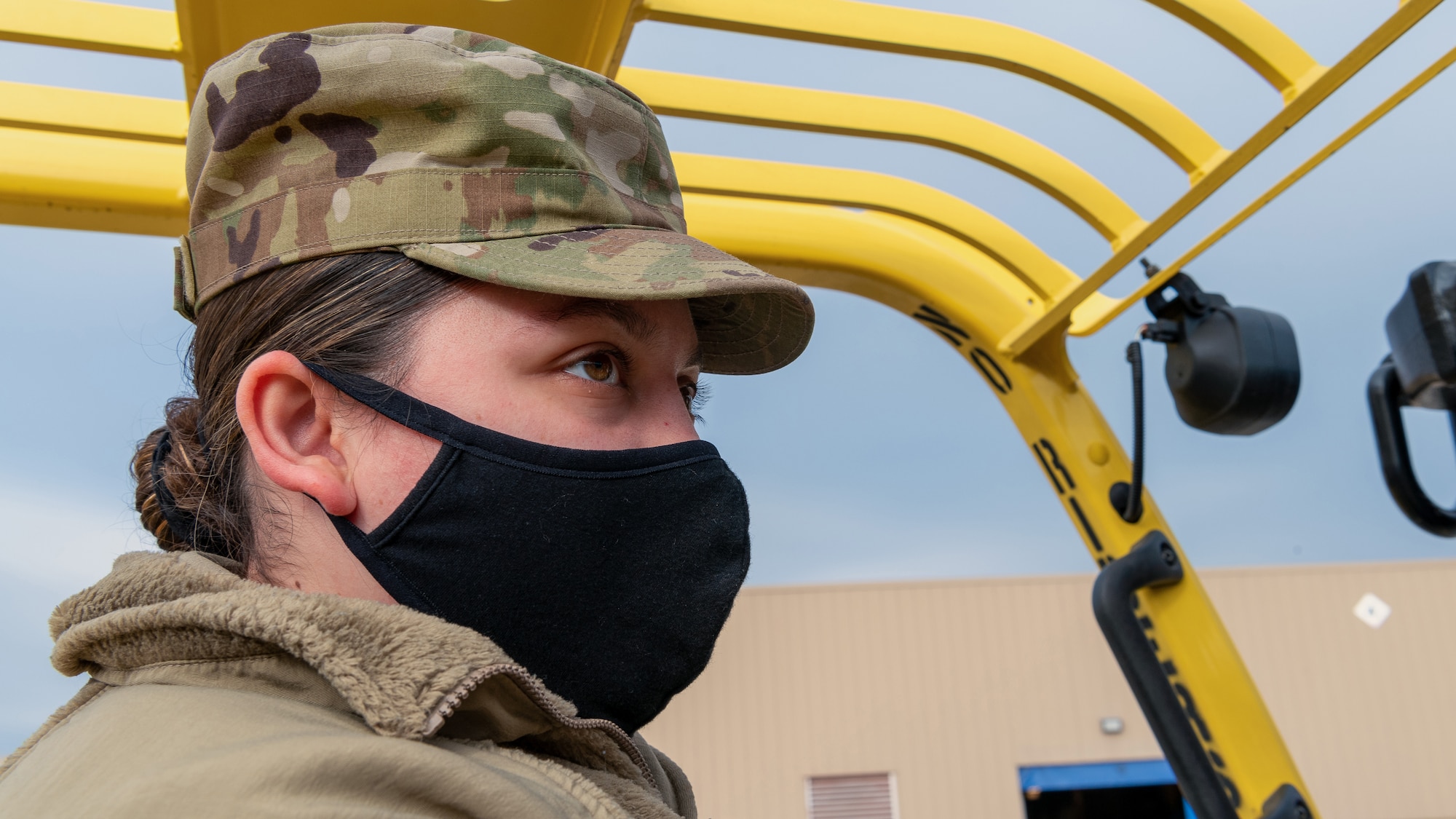 Airman driving forklift.