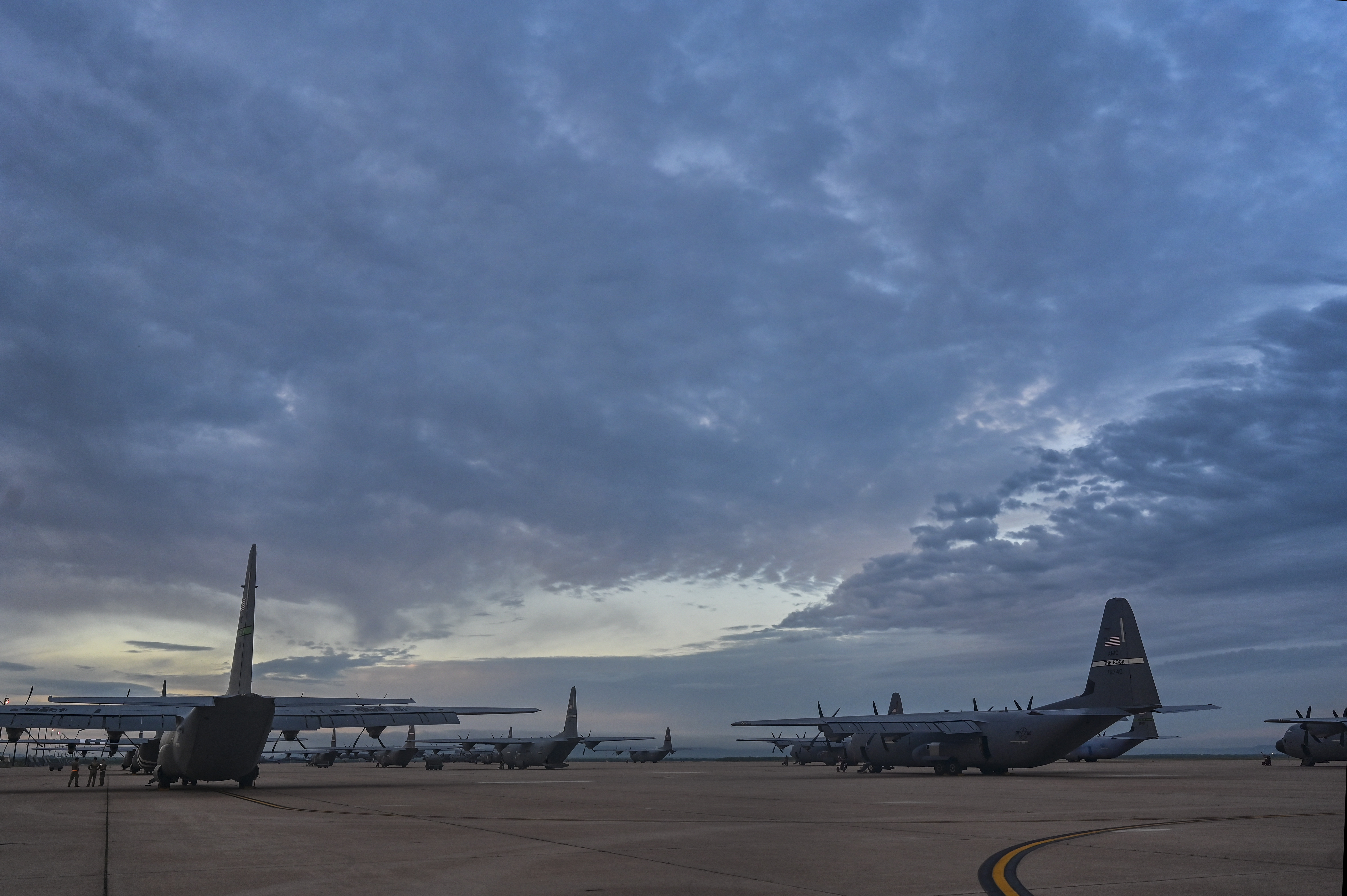 A C-130J is parked on the runway and prepared for take-off during a training exercise for class 21A Weapons Instructor Course at Dyess Air Force Base, Texas, June 5, 2021. Both C-130H and C-130J models were launched and conducted combat aerial support after months of training and planning from the pilot students. (U.S. Air Force photo by Tech. Sgt. Alexandre Montes)