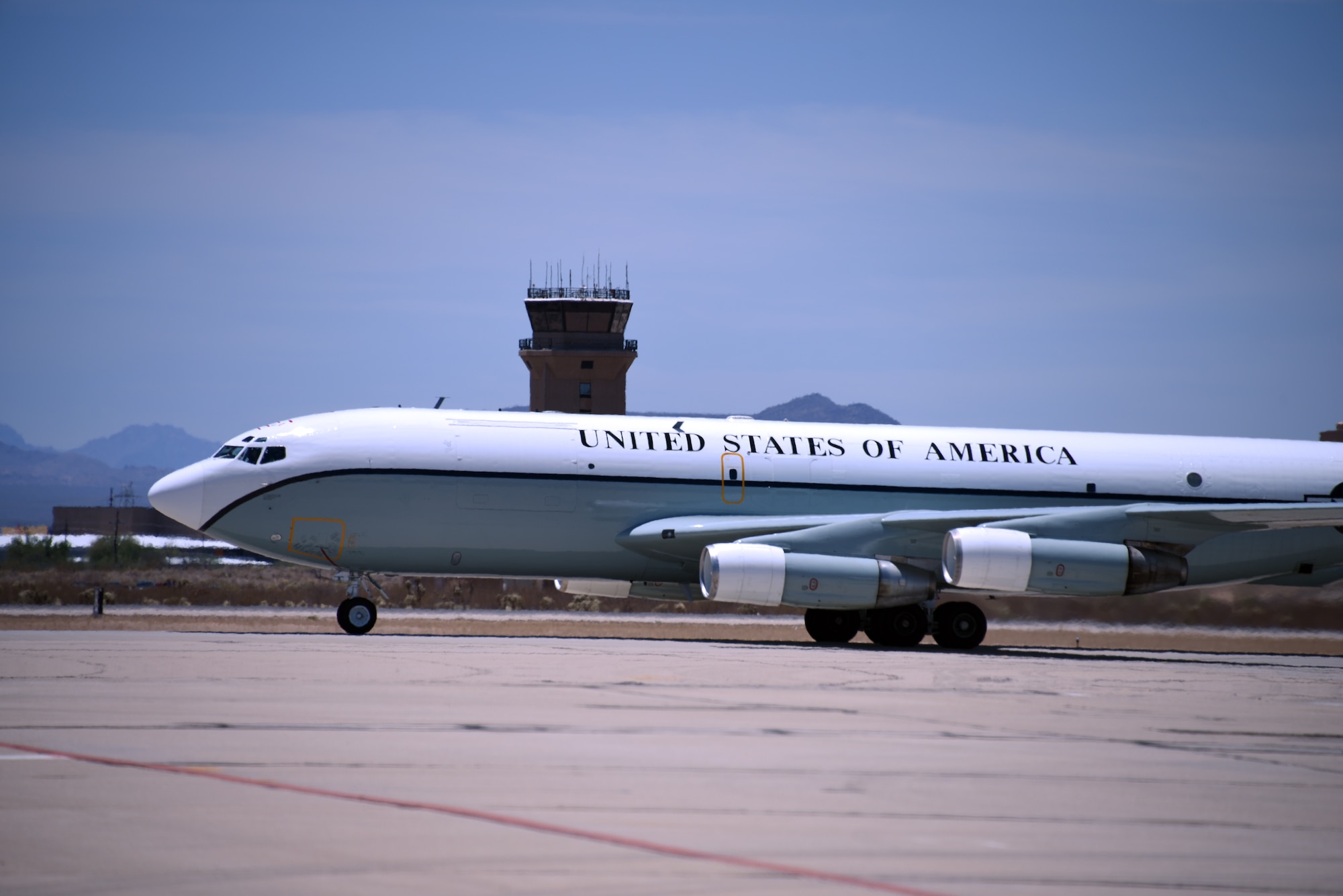 An aircraft landing on the flight line.