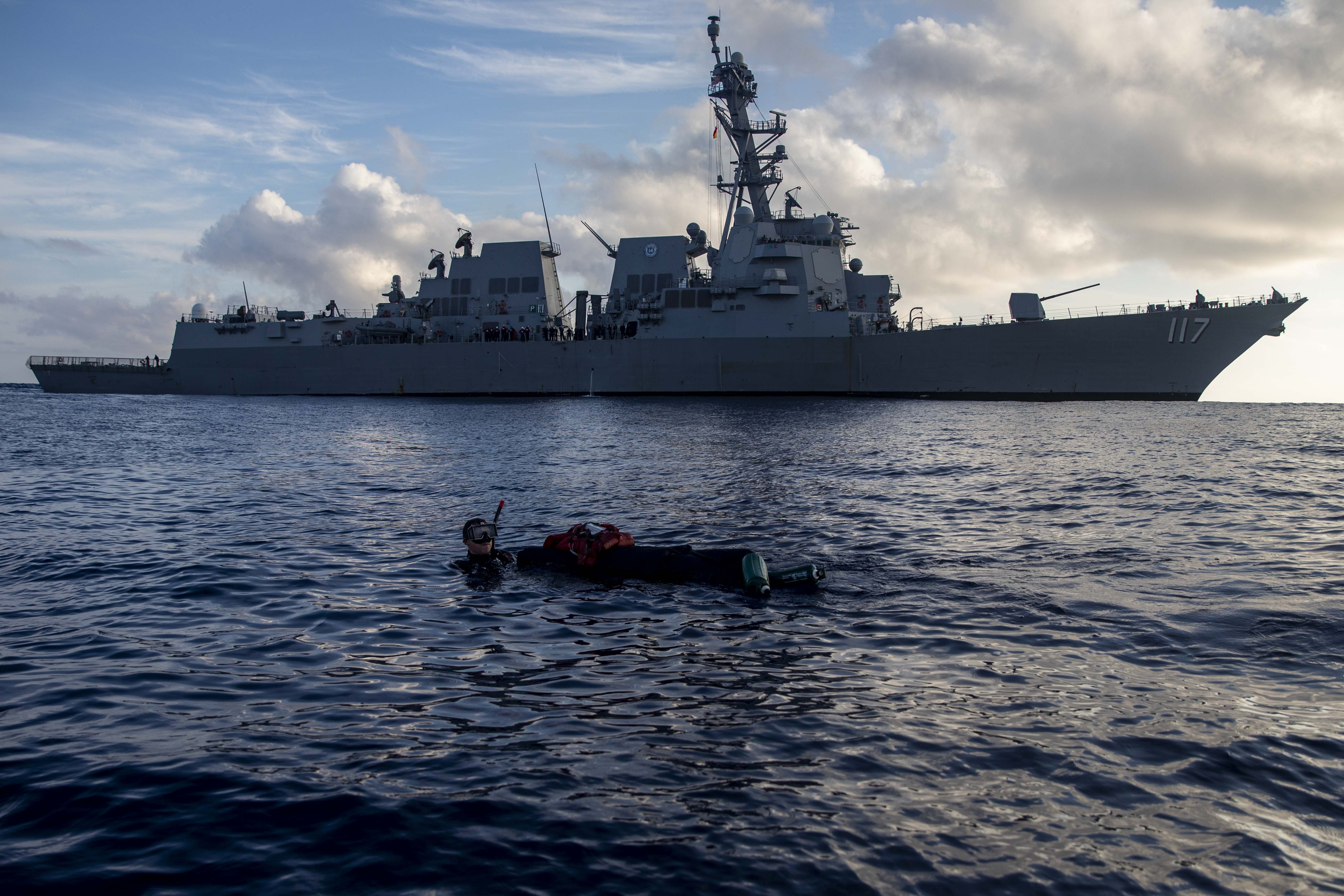 A Sailor assigned to USS Paul Ignatius (DDG 117), conducts search and recovery training during a man overboard drill in the Atlantic Ocean, June 12, 2021.