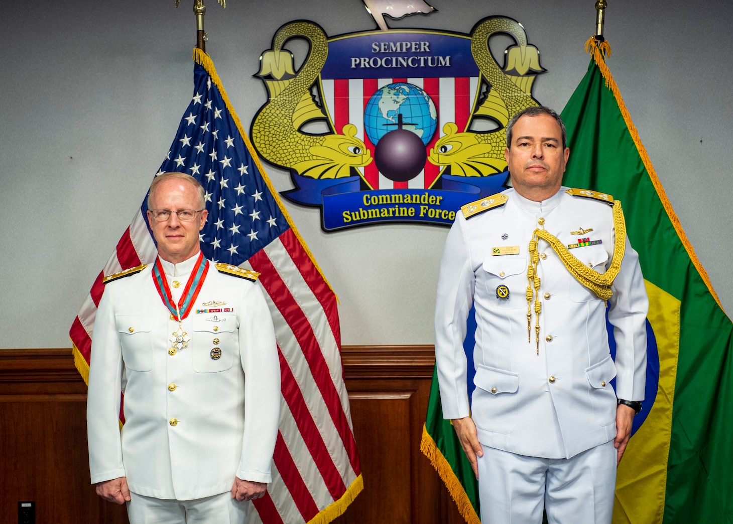 Vice Adm. Daryl Caudle, commander, U.S. Submarine Forces (SUBFOR), left, and Vice Adm. Amaury Calheiros, Brazilian Naval Attaché, participate in an award ceremony at SUBFOR Headquarters, June 14, 2021.