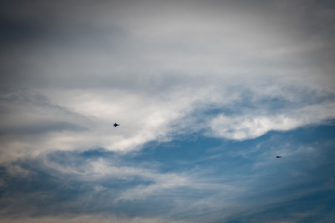 F-15E Strike Eagles from the 4th Fighter Wing perform a flyover above the Flags for Heroes event in Clayton, North Carolina, June 14, 2021. The event featured more than 1,100 flags on display to honor Veterans, first-responders and healthcare workers. (U.S. Air Force photo by Airman 1st Class David Lynn)