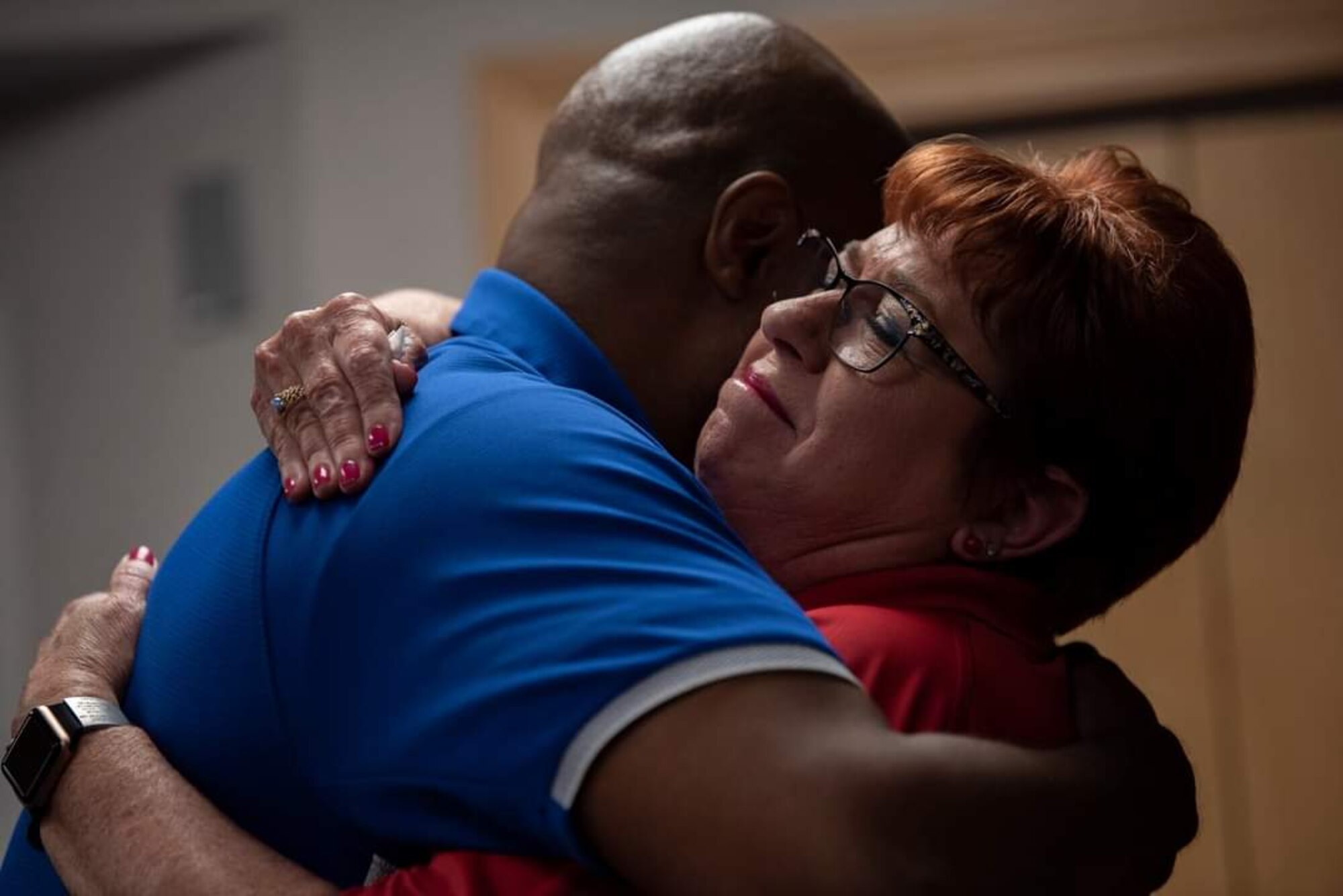 Master Sgt. (ret) Jonathan Session, hugs his Recovery Care Coordinator, Debra Morotini, at Dyess Air Force Base, Texas on June 7, 2021. Mrs. Morotini helped Jonathan get his military pay and Tricare benefits fixed once he was not authorized to retire on his original date. This issue caused a lot of stress for Jonathan and his family. He now refers to Mrs. Morotini as his “angel.” (U.S. Air Force photo by A1C Colin Hollowell)